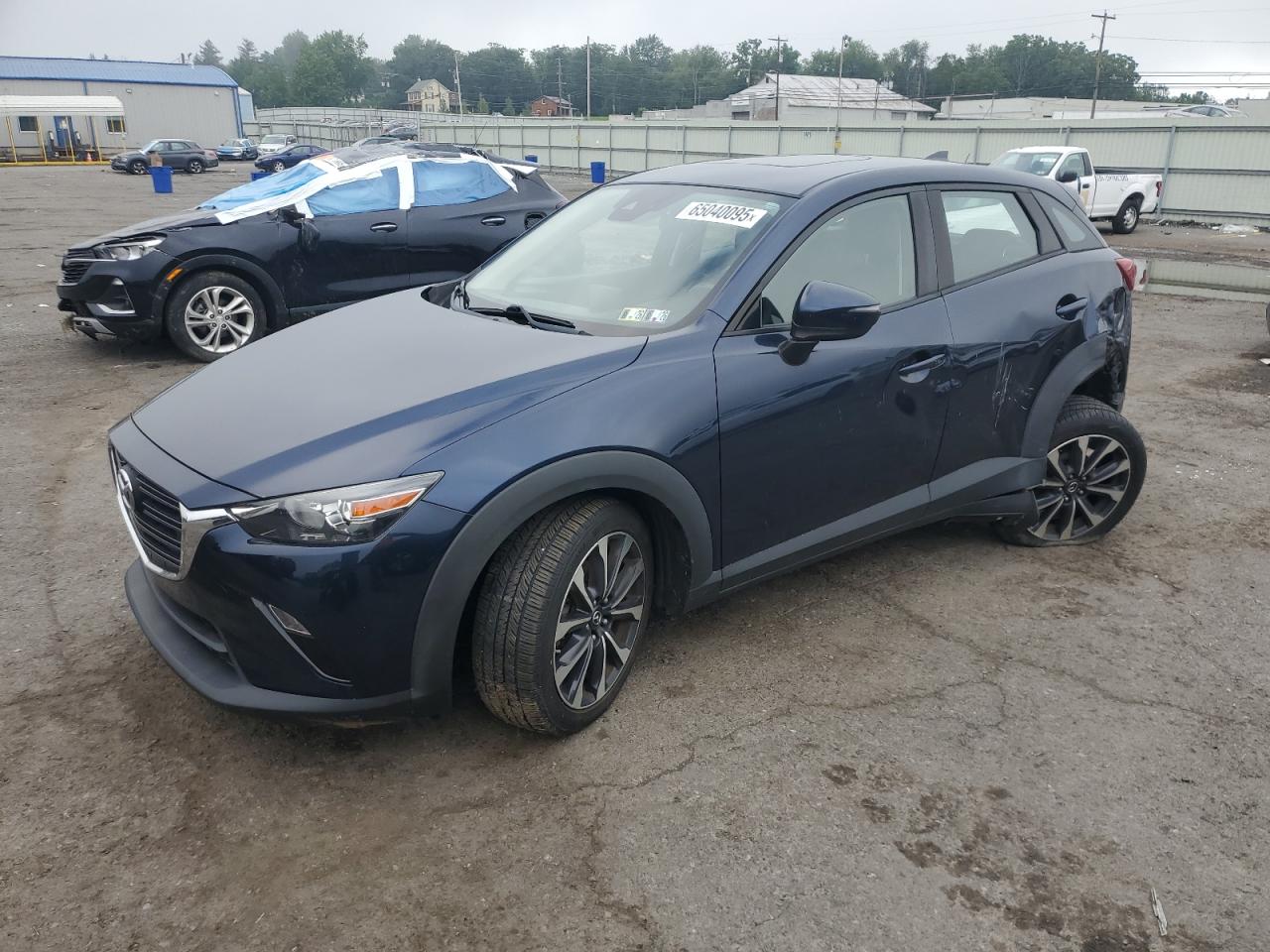 2019 Mazda CX-3 Touring, VIN JM1DKFC73K1417827 — Rear end