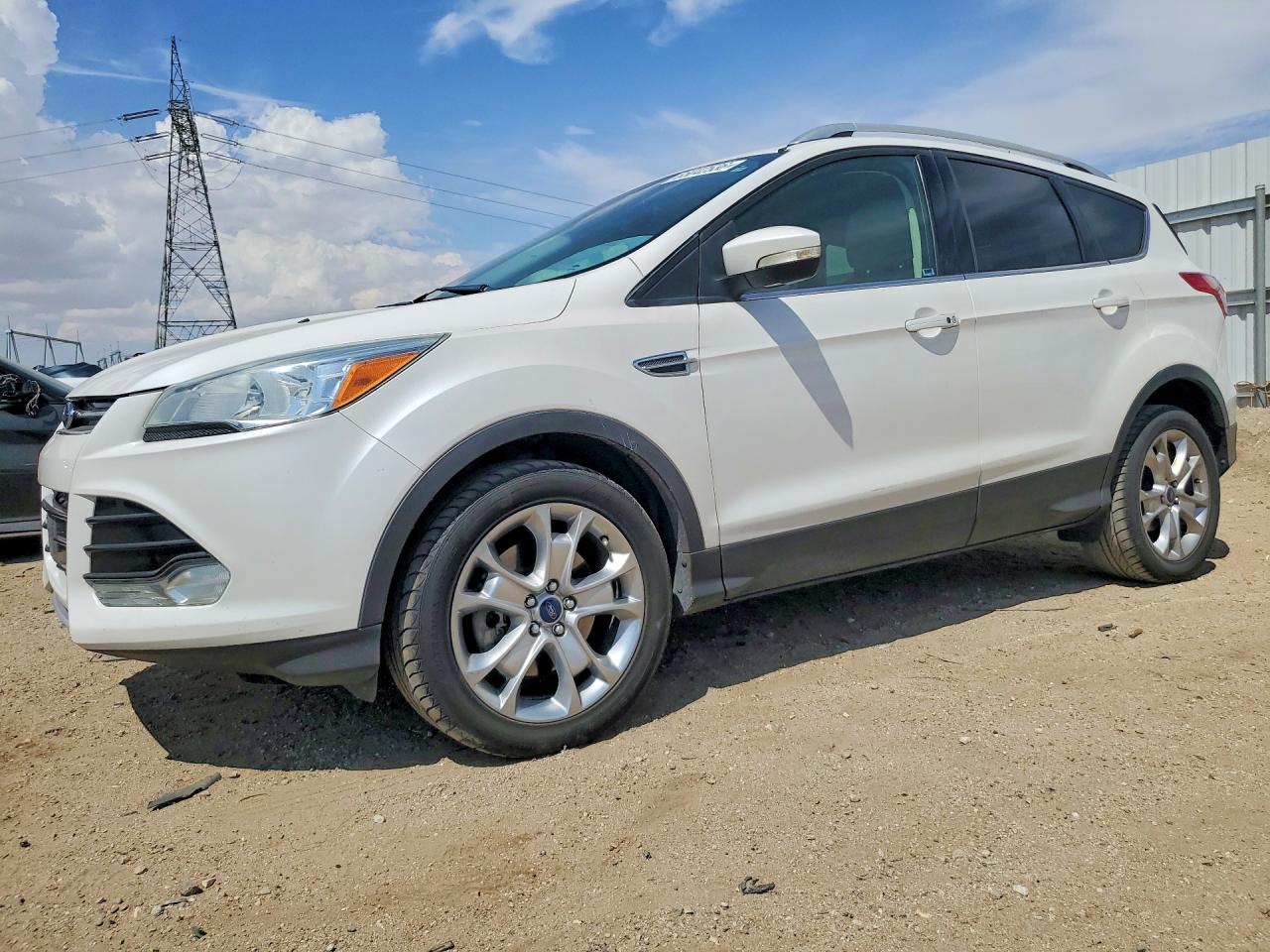 2016 Ford Escape Titanium, VIN 1FMCU0J99GUC59714 — Minor dents and scratches