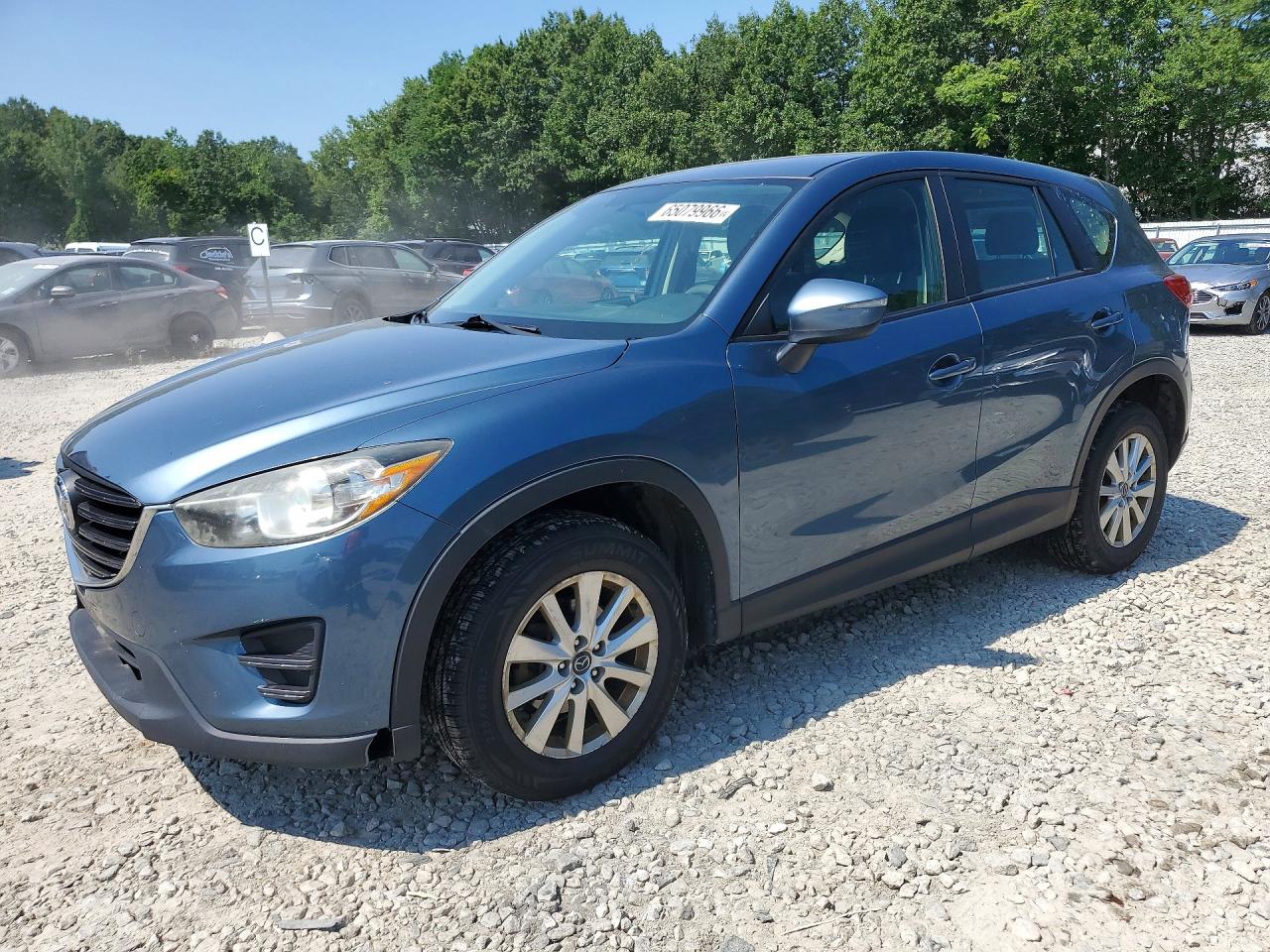 2016 Mazda CX-5 Sport, VIN JM3KE4BY5G0629582 — Minor dents and scratches