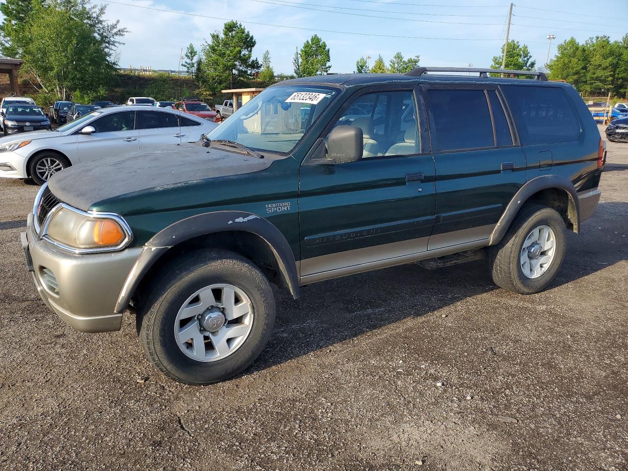 2001 Mitsubishi Montero Sport LS, VIN JA4MT31H41P054449 — Мелкие вмятины и царапины