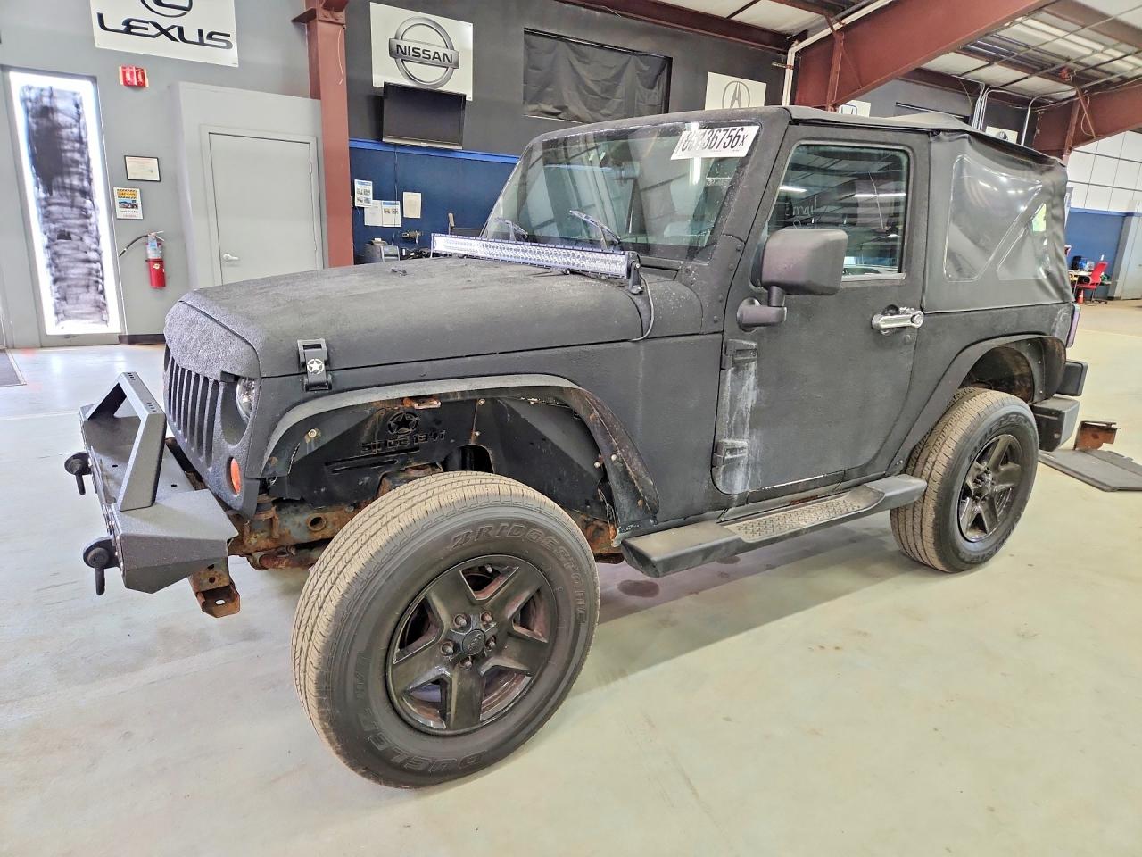 2009 Jeep Wrangler Sahara, VIN 1J4FA54189L709188 — Minor dents and scratches