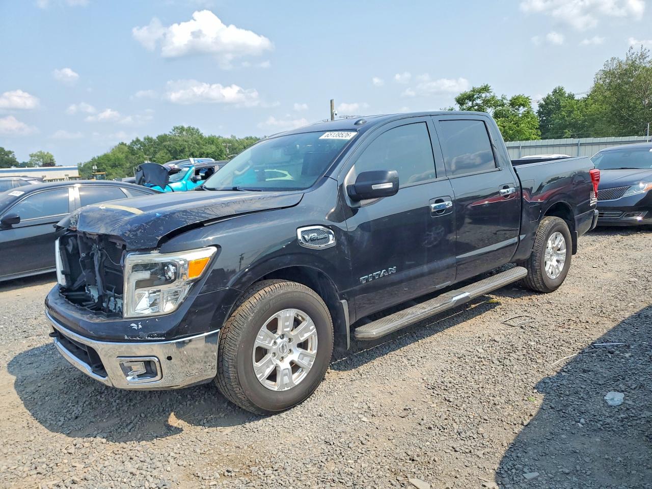 2017 Nissan Titan SL, VIN 1N6AA1E67HN528909 — Front end