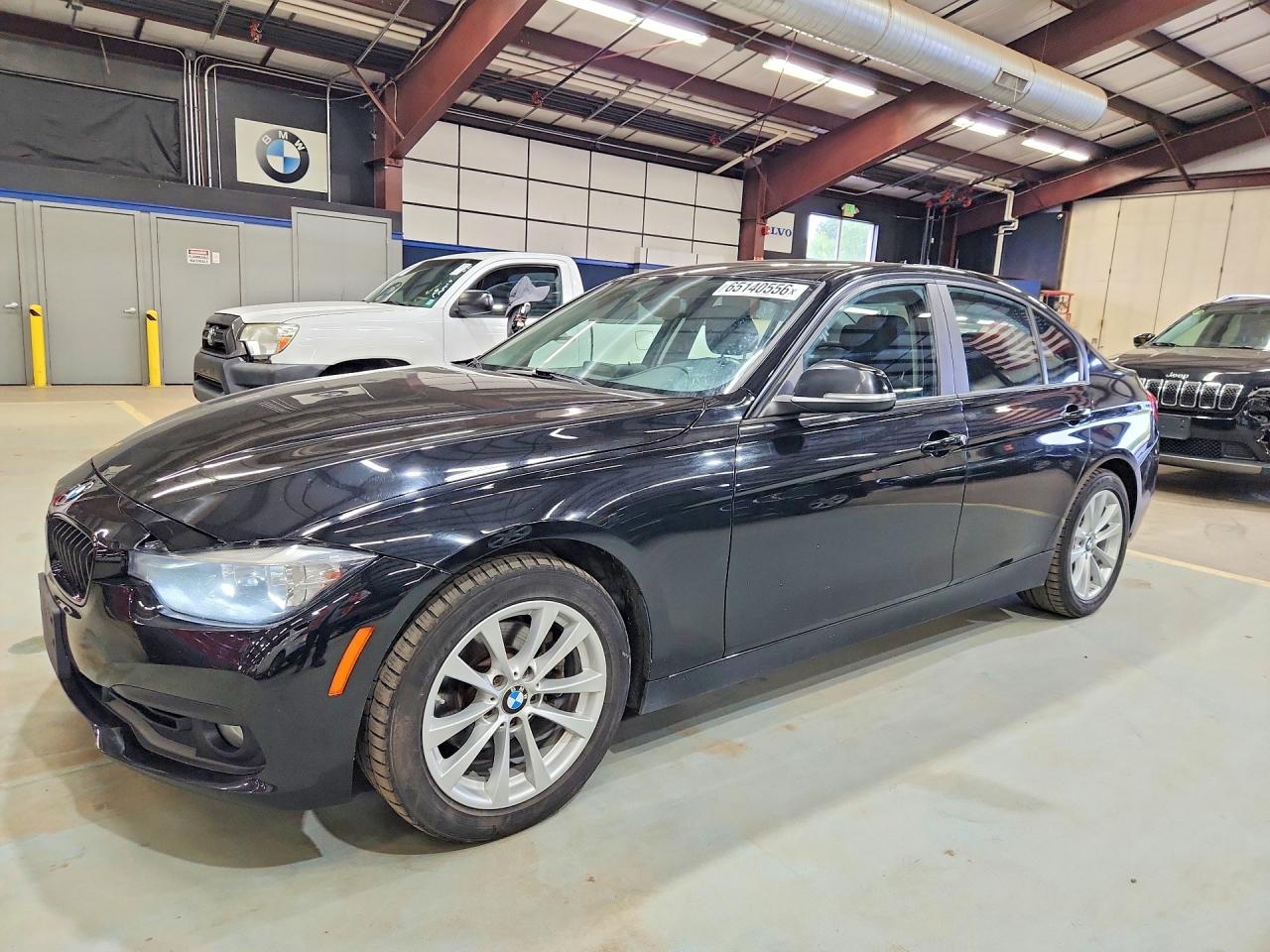 2017 BMW 3 Series 320i xDrive, VIN WBA8A3C55HK691192 — Rear end