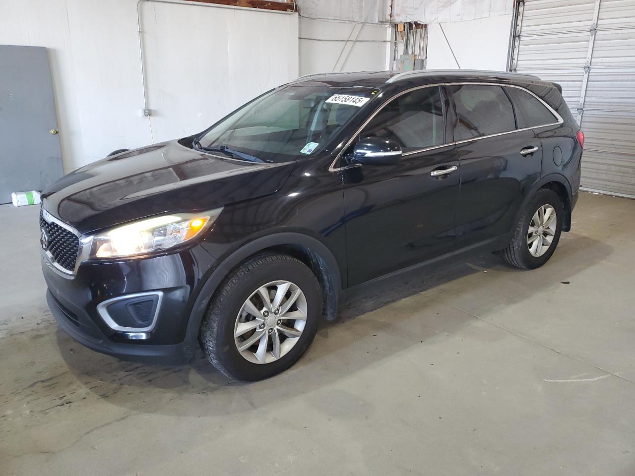 2016 Kia Sorento LX, VIN 5XYPG4A32GG032625 — Front end