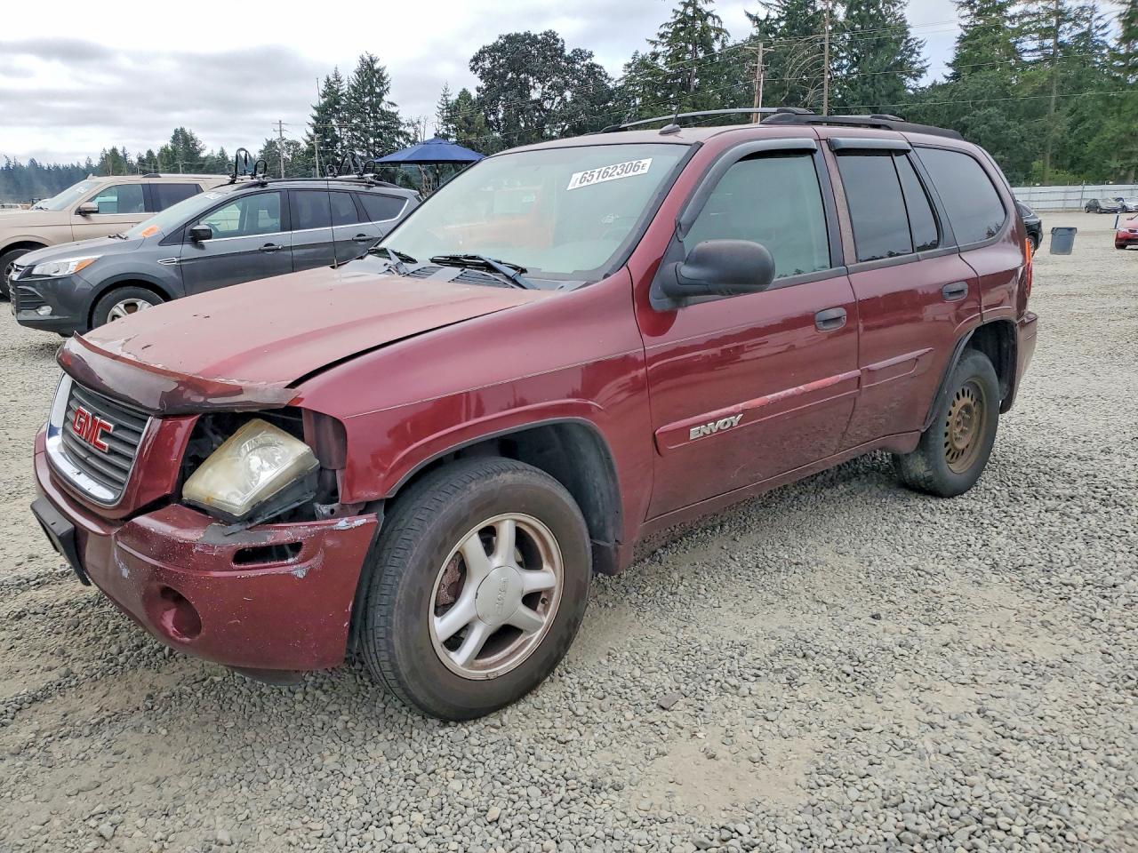 2005 GMC Envoy SLT, VIN 1GKDS13S252195131 — Перед