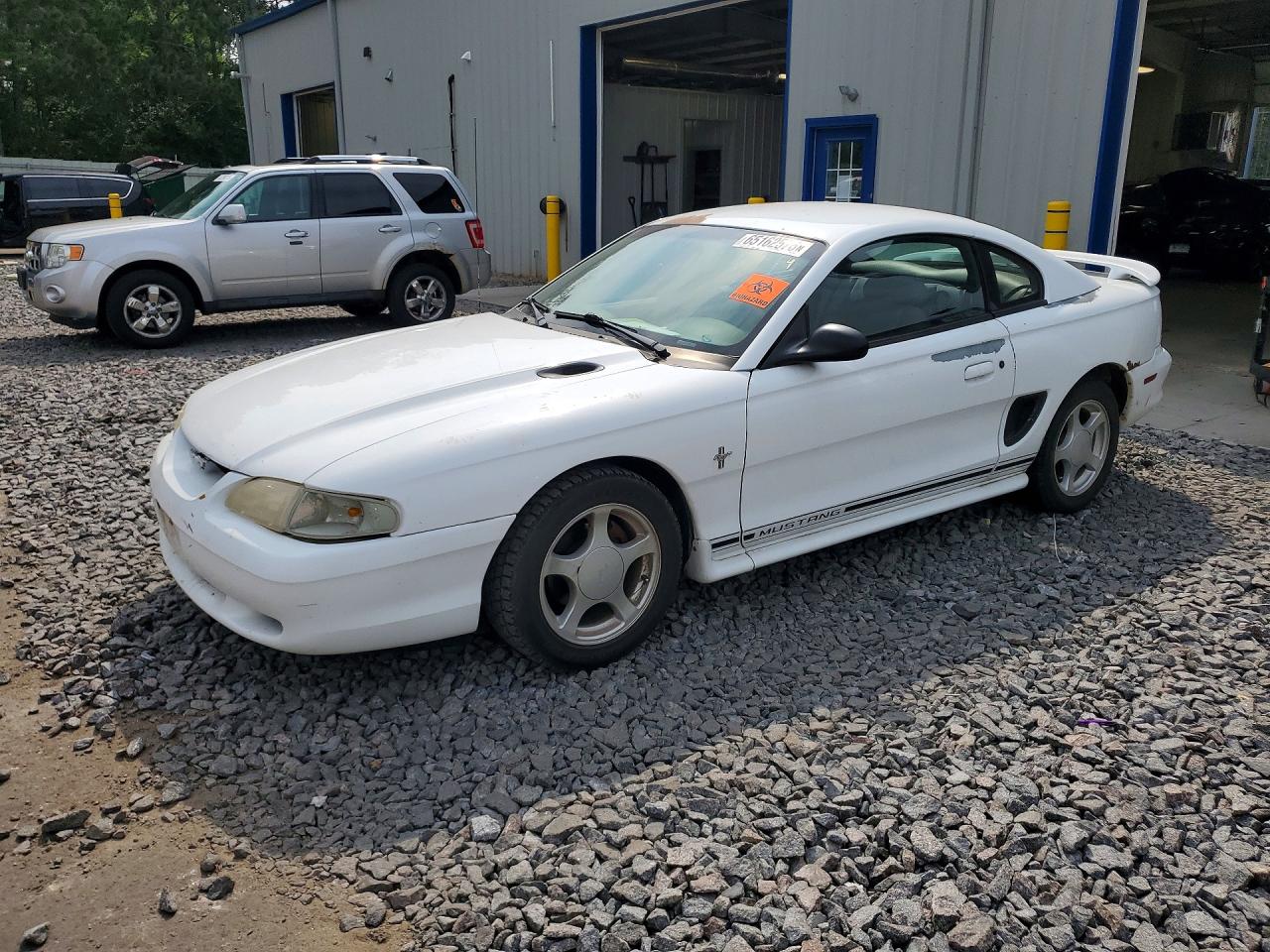 1998 Ford Mustang, VIN 1FAFP4041WF186692 — Мелкие вмятины и царапины