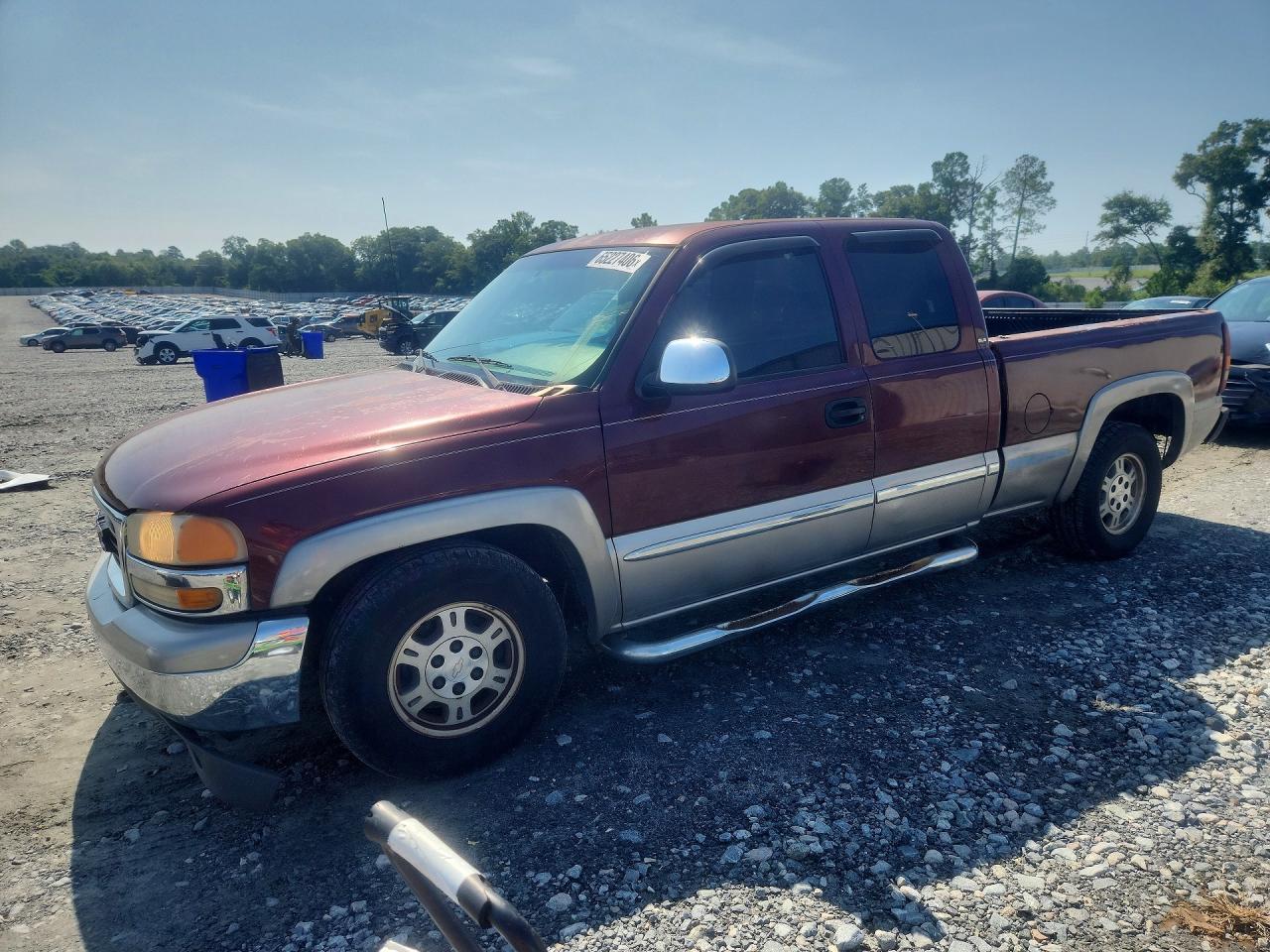 2002 GMC Sierra 1500 SLE, VIN 2GTEC19V021118591 — Side