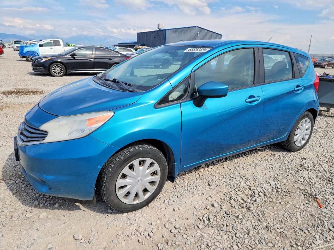 2015 Nissan Note S, VIN 3N1CE2CPXFL399467 — Minor dents and scratches
