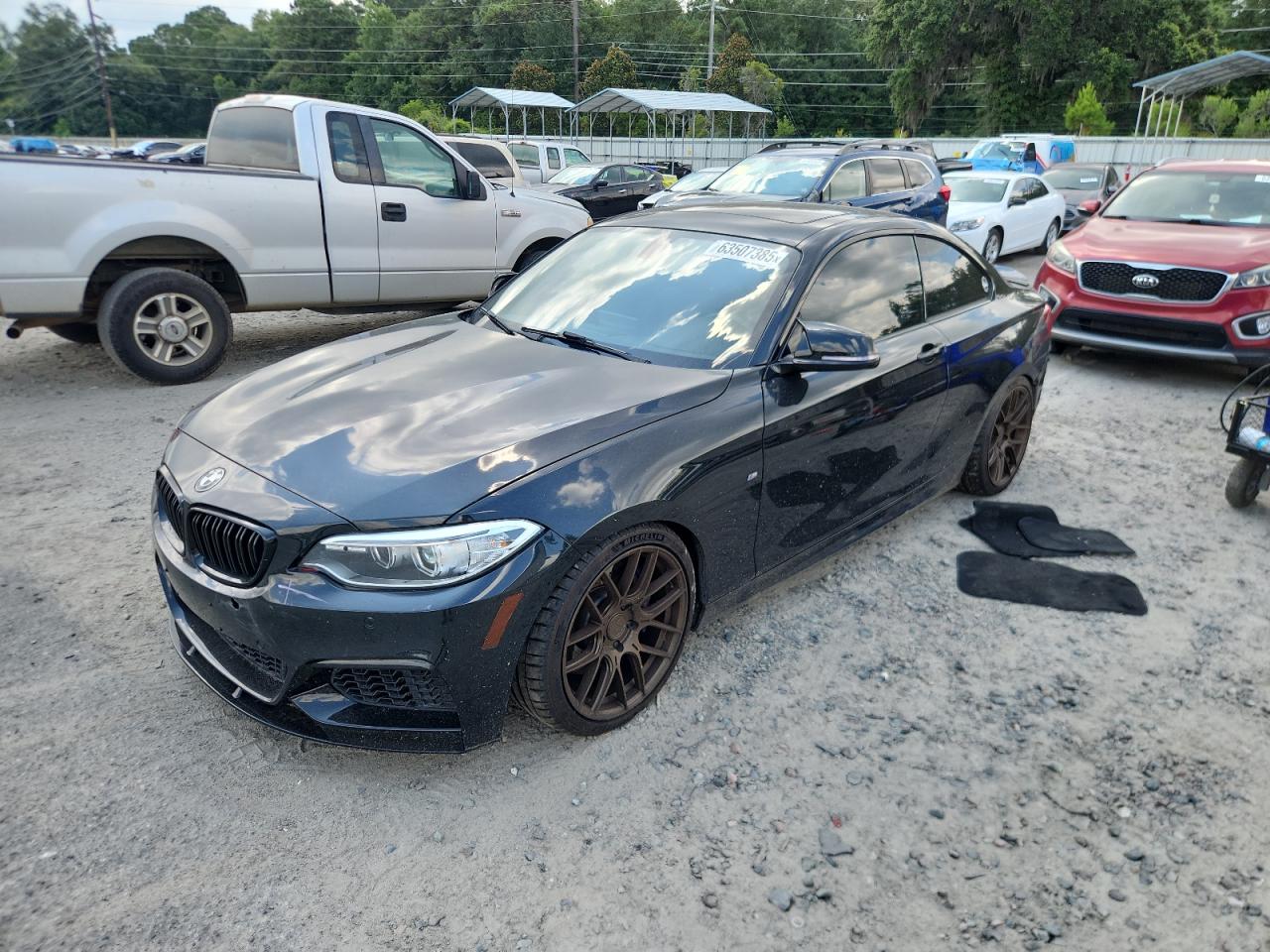 2015 BMW 2 Series M235i, VIN WBA1J7C53FV289322 — Rear end