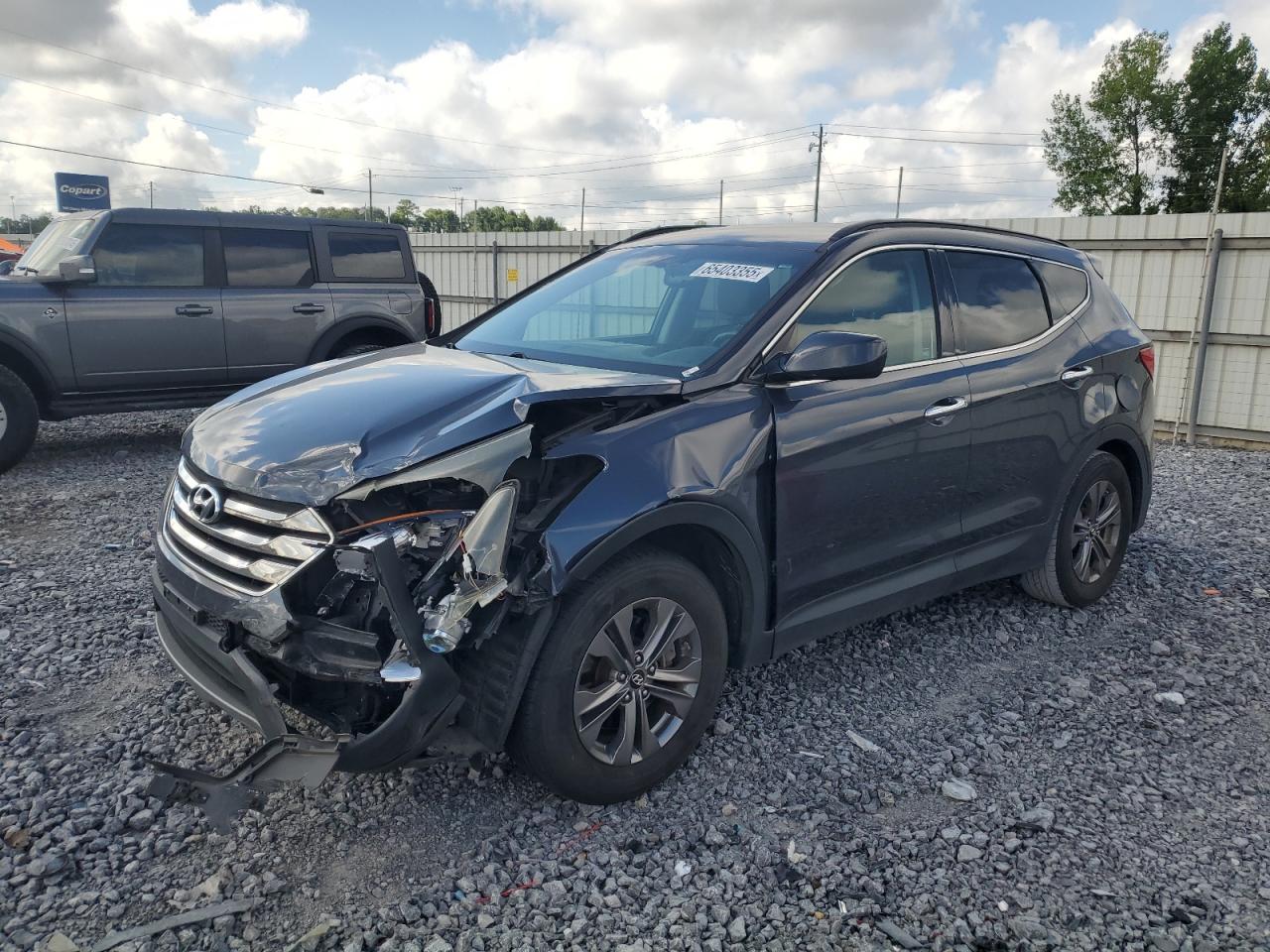 2013 Hyundai Santa Fe Sport, VIN 5XYZU3LB7DG007523 — Front end