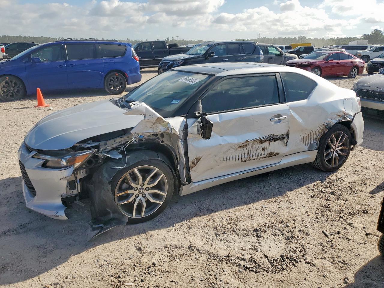 2014 Scion tC 10 Series, VIN JTKJF5C72E3072874 — Side