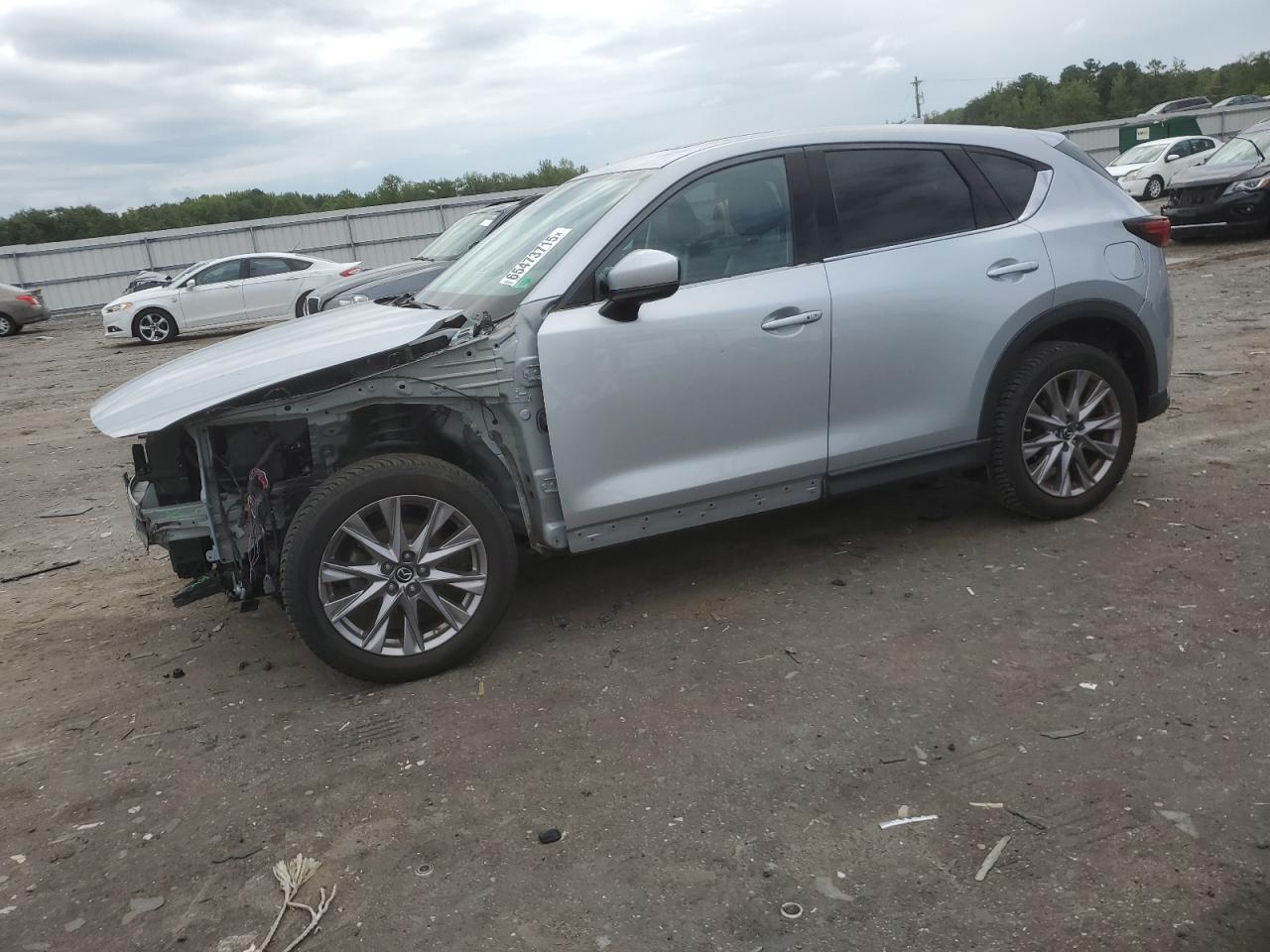 2019 Mazda CX-5 Grand Touring, VIN JM3KFADM8K1554496 — Front end