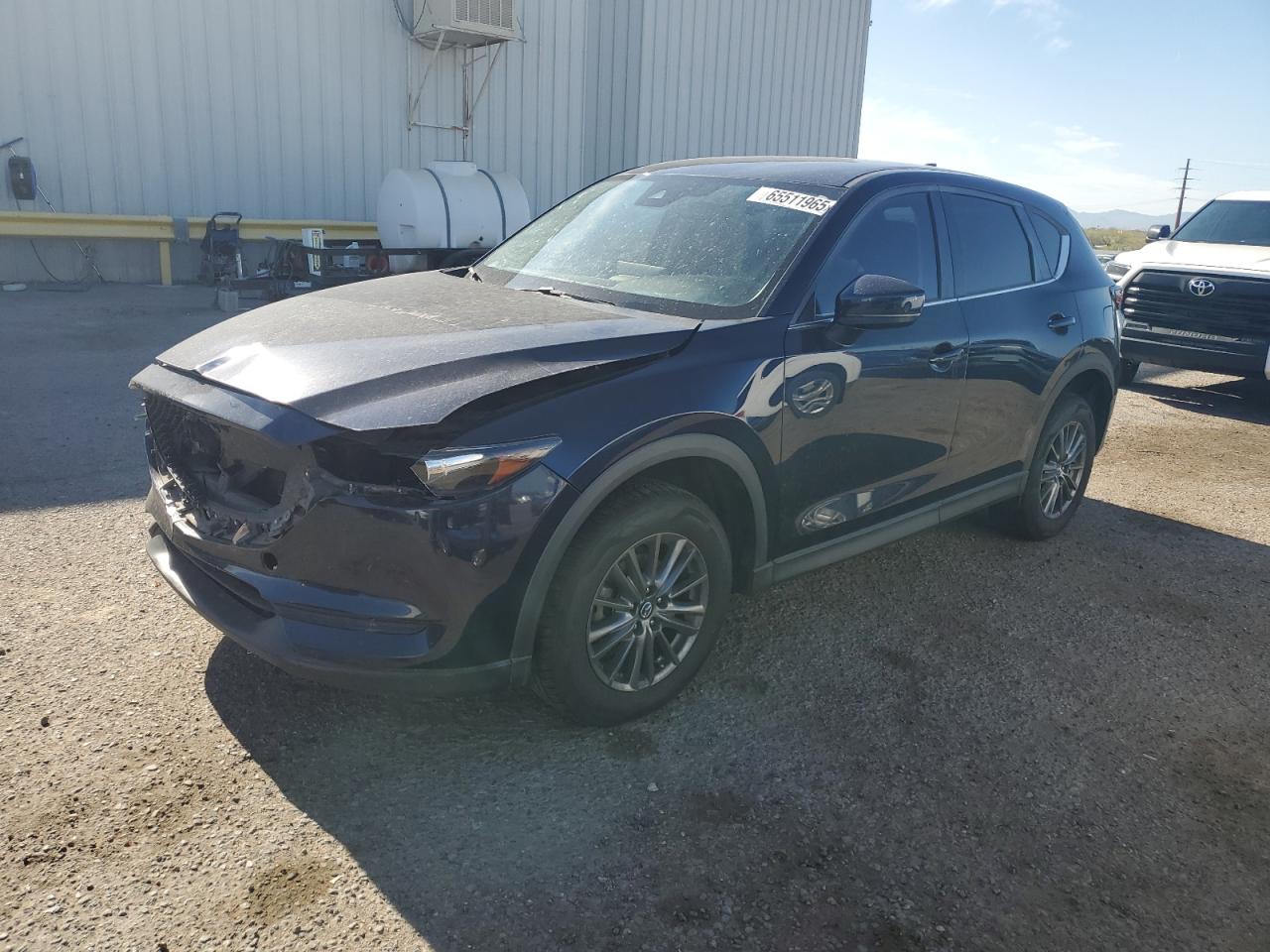 2021 Mazda CX-5 Touring, VIN JM3KFBCMXM0447997 — Front end