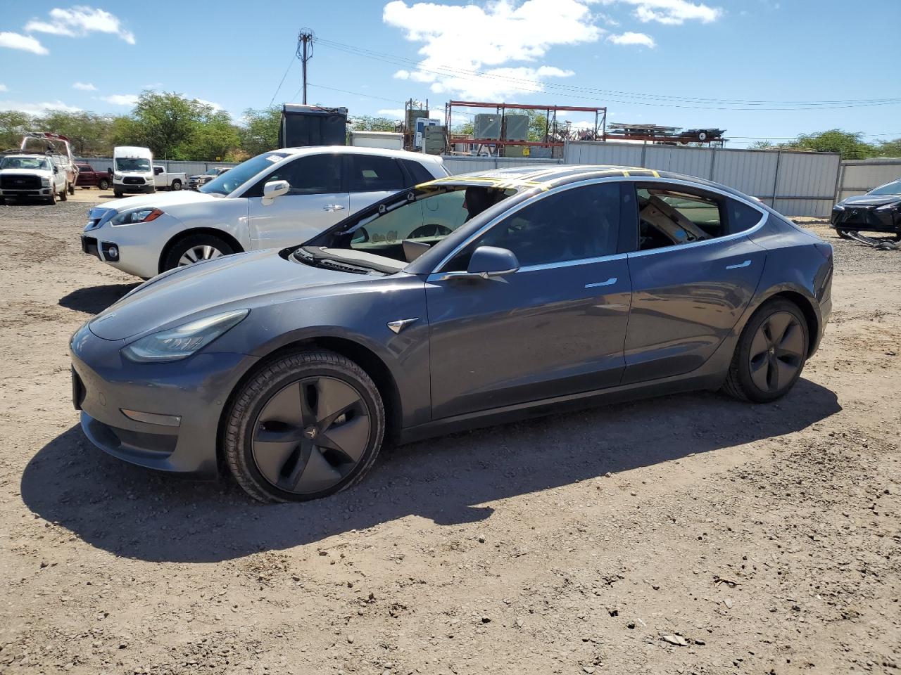 2019 Tesla Model 3 Long Range, VIN 5YJ3E1EB4KF209888 — Vandalism