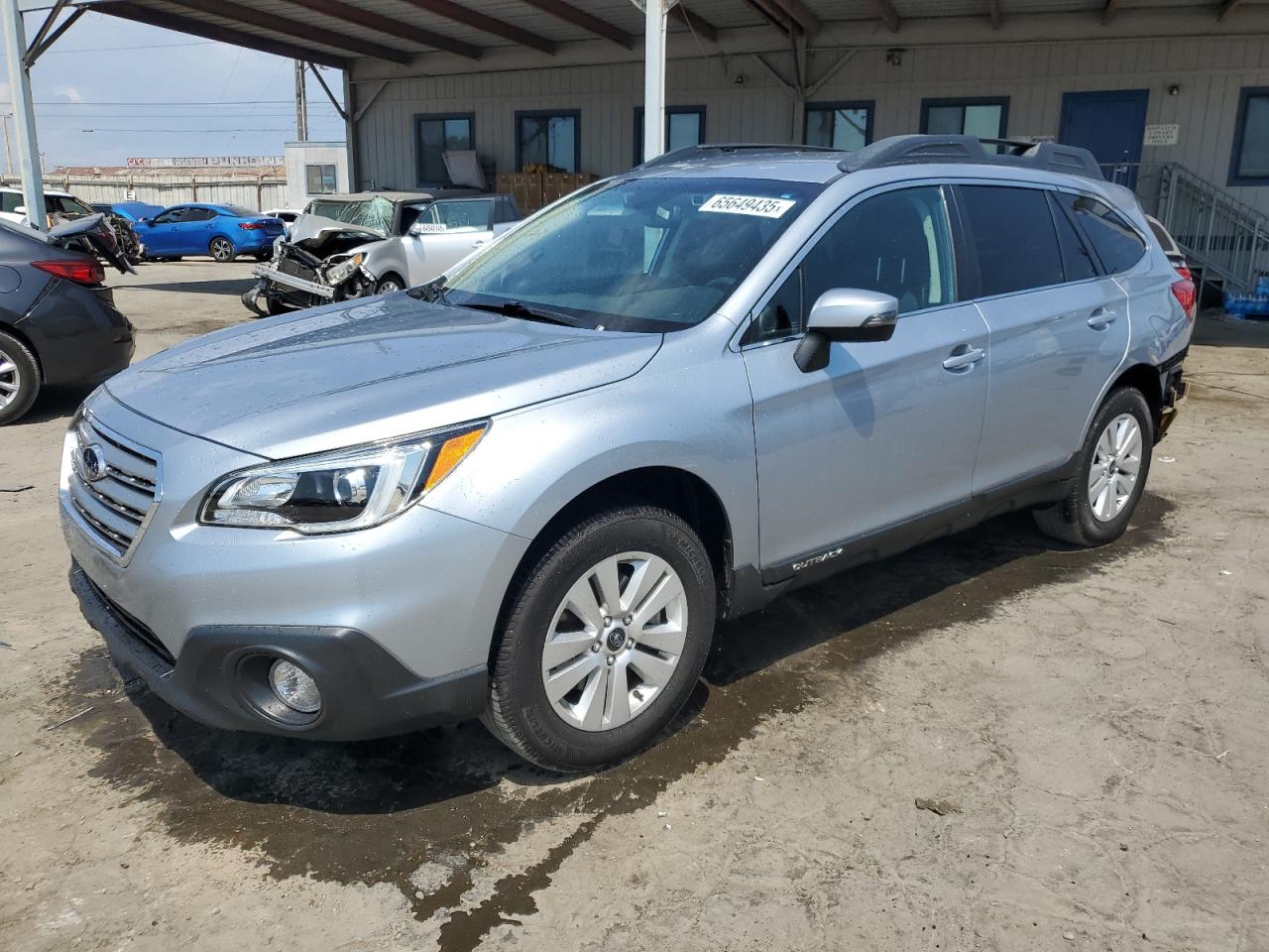 2016 Subaru Outback Premium, VIN 4S4BSAFC3G3206380 — Side