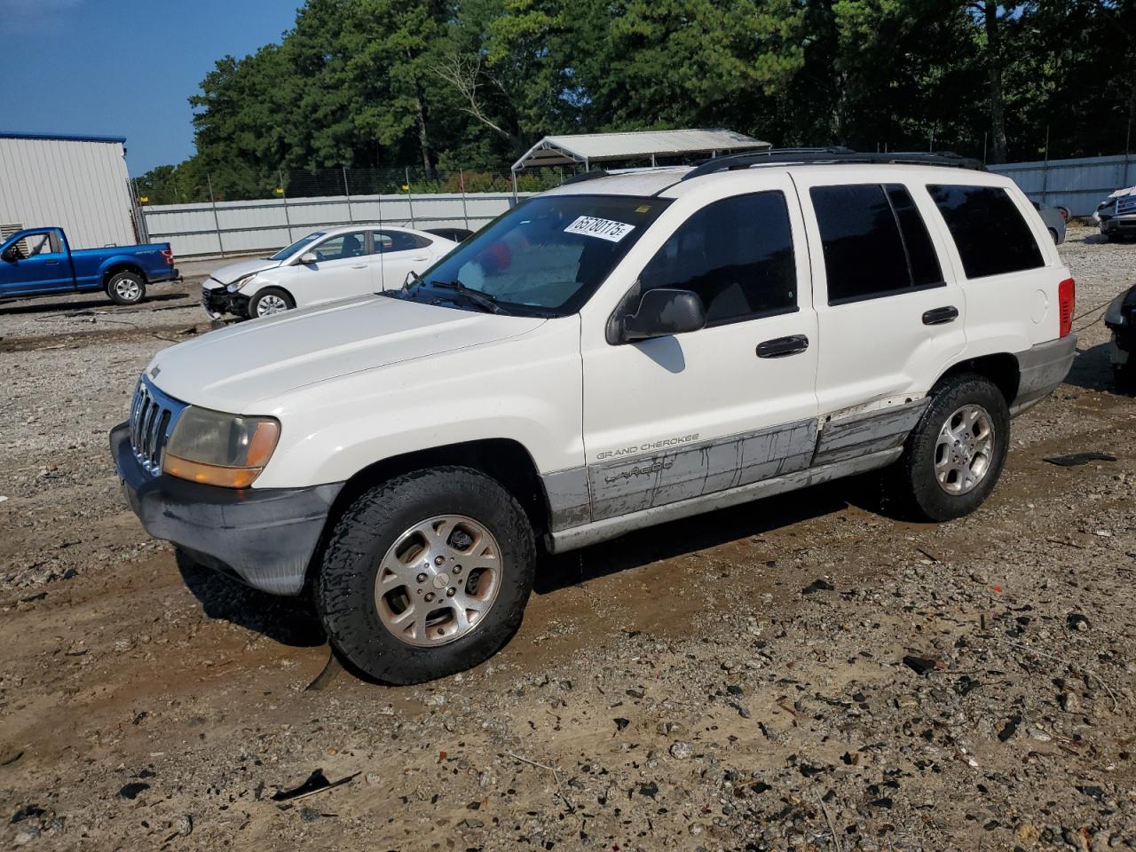 1999 Jeep Grand Cherokee Laredo, VIN 1J4G258S4XC543625 — Side