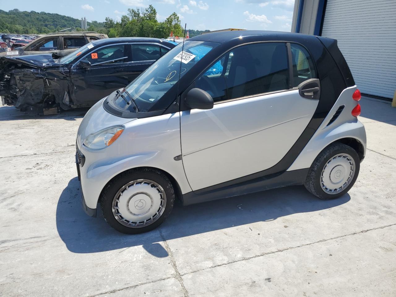 2013 Smart fortwo Pure, VIN WMEEJ3BA1DK690444 — Side