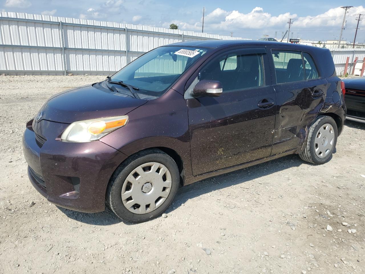 2010 Scion xD, VIN JTKKU4B49AJ054678 — Side