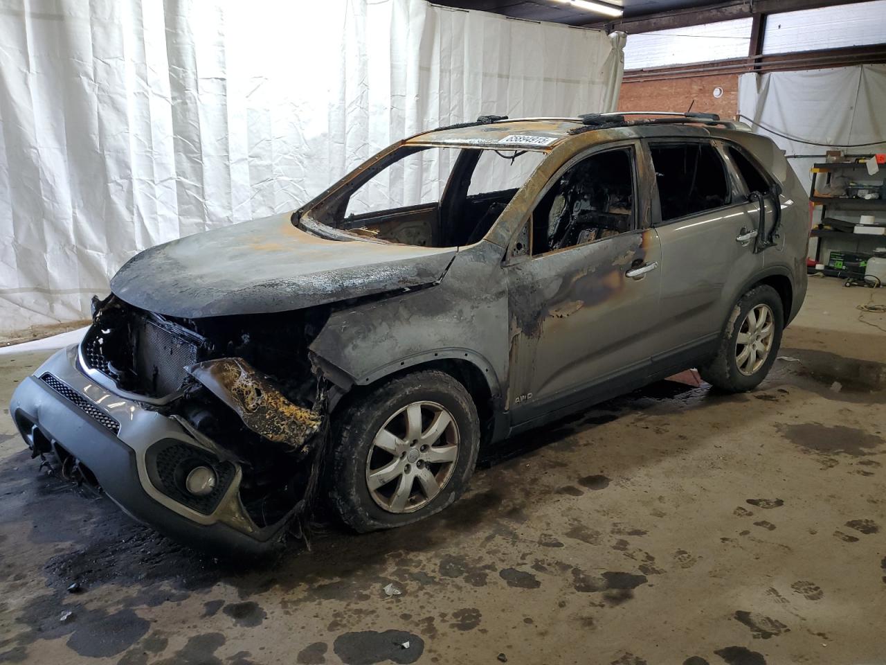 2012 Kia Sorento LX, VIN 5XYKTCA6XCG222483 — Пожар в салоне