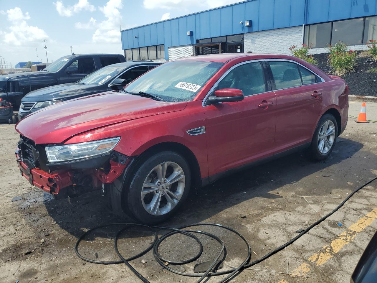 2013 Ford Taurus SEL, VIN 1FAHP2E84DG174486 — Front end