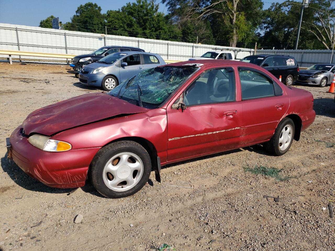 1996 Ford Contour GL, VIN 1FALP6531TK144556 — Rollover