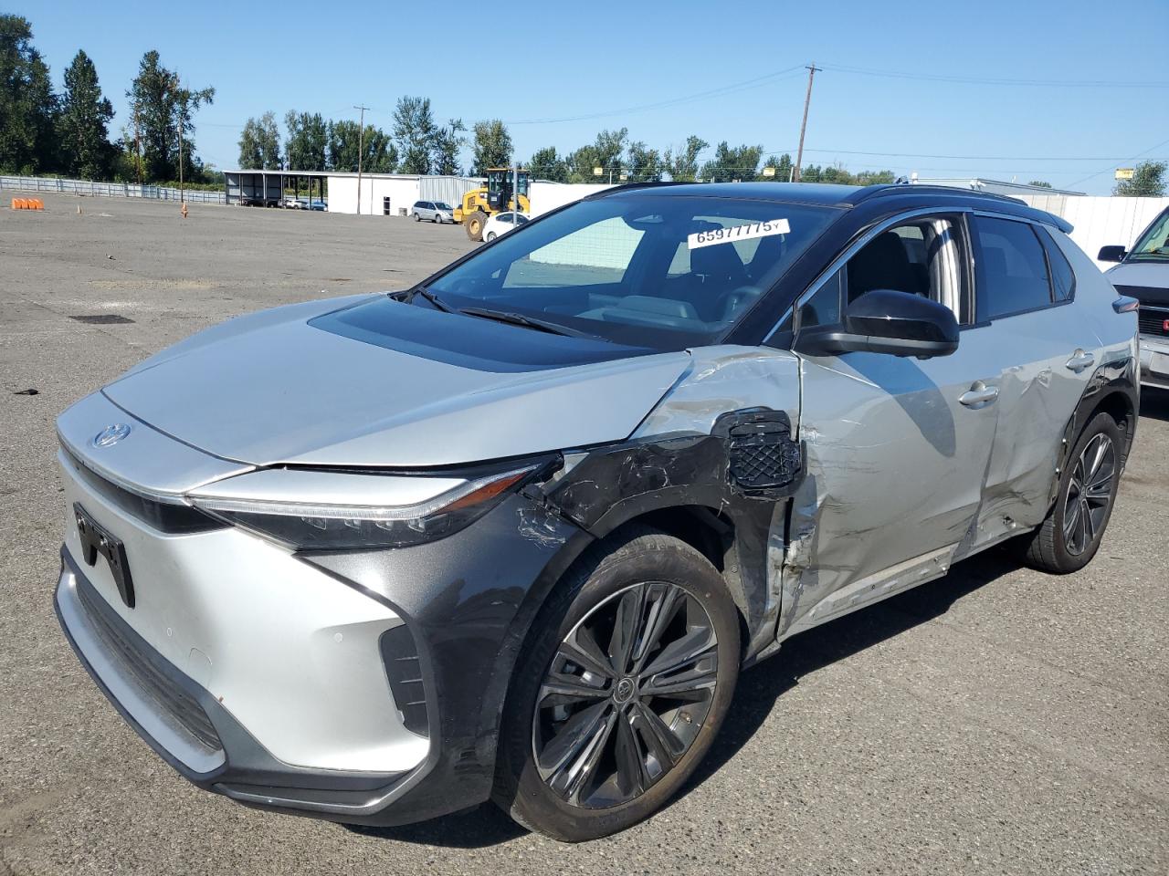 2023 Toyota bZ4X XLE, VIN JTMABACAXPA033178 — Side