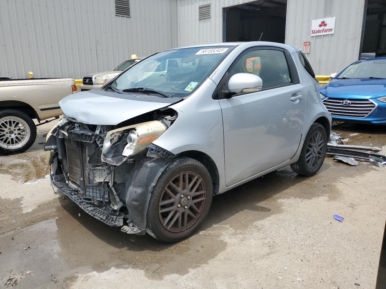 2014 Scion iQ, VIN JTNJJXB04EJ027464 — Front end