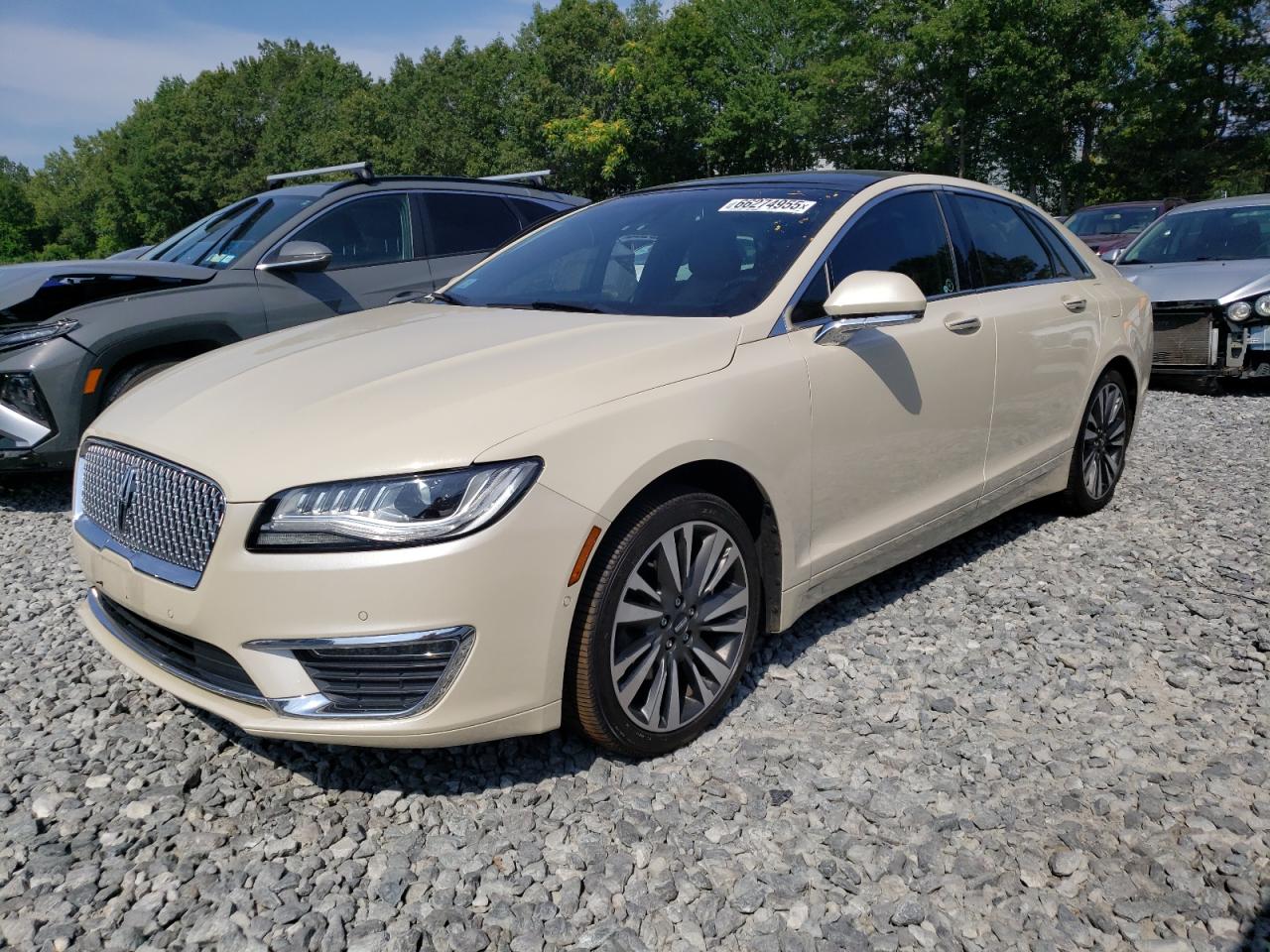2018 Lincoln MKZ Reserve, VIN 3LN6L5F92JR619619 — Side