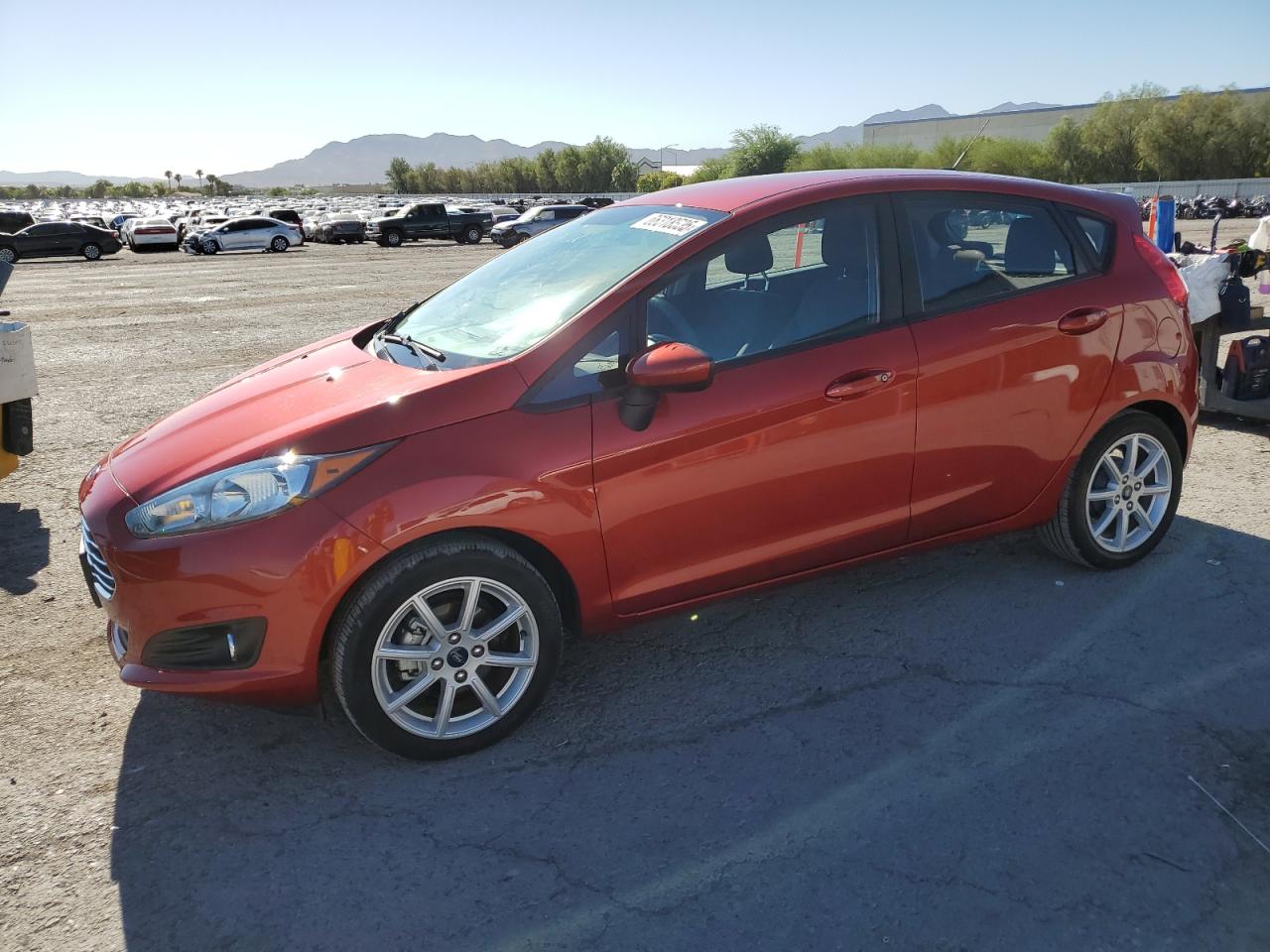 2019 Ford Fiesta SE, VIN 3FADP4EJ8KM127624 — Side