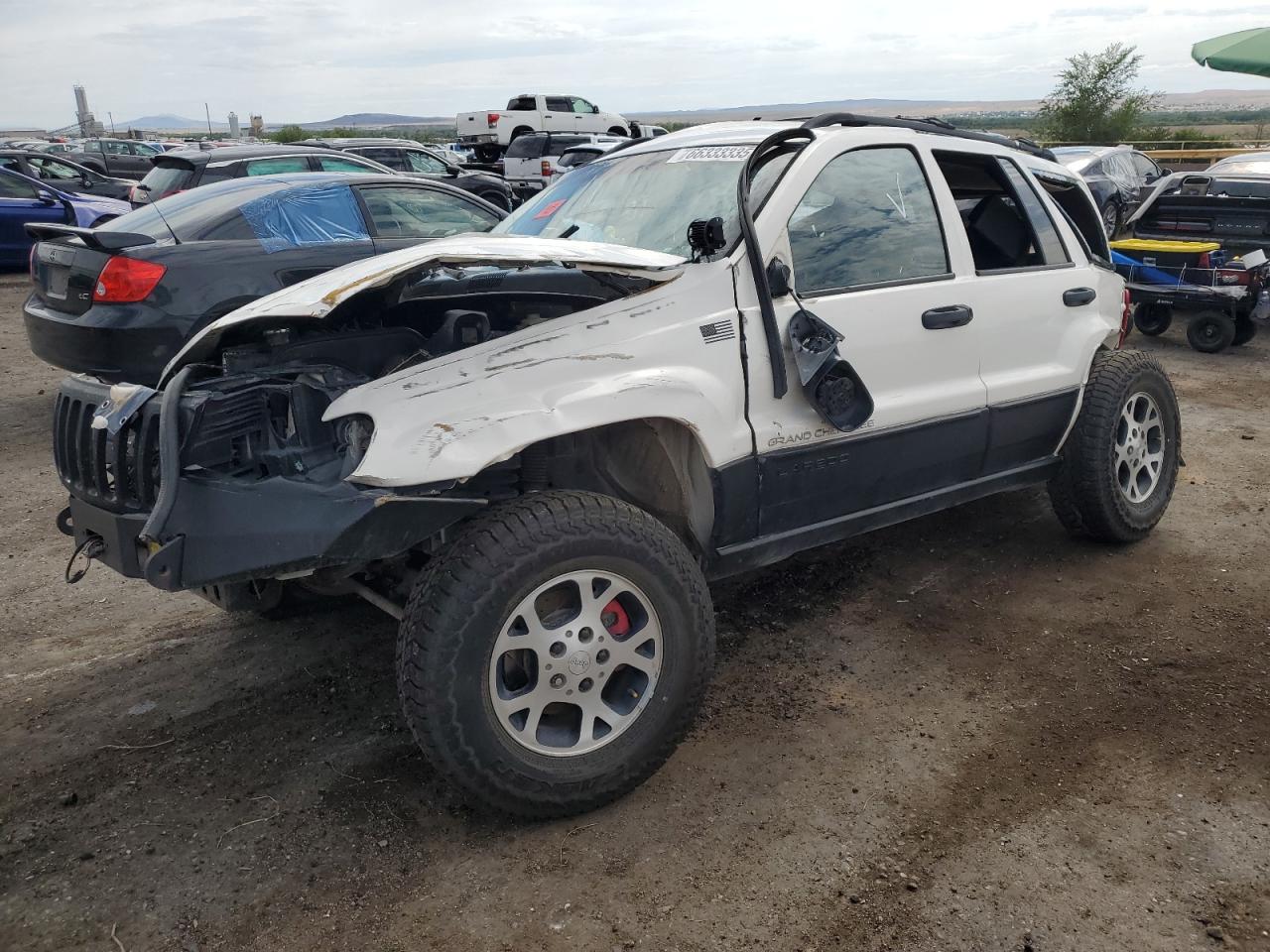 1999 Jeep Grand Cherokee Laredo, VIN 1J4GW58S3XC594070 — All over