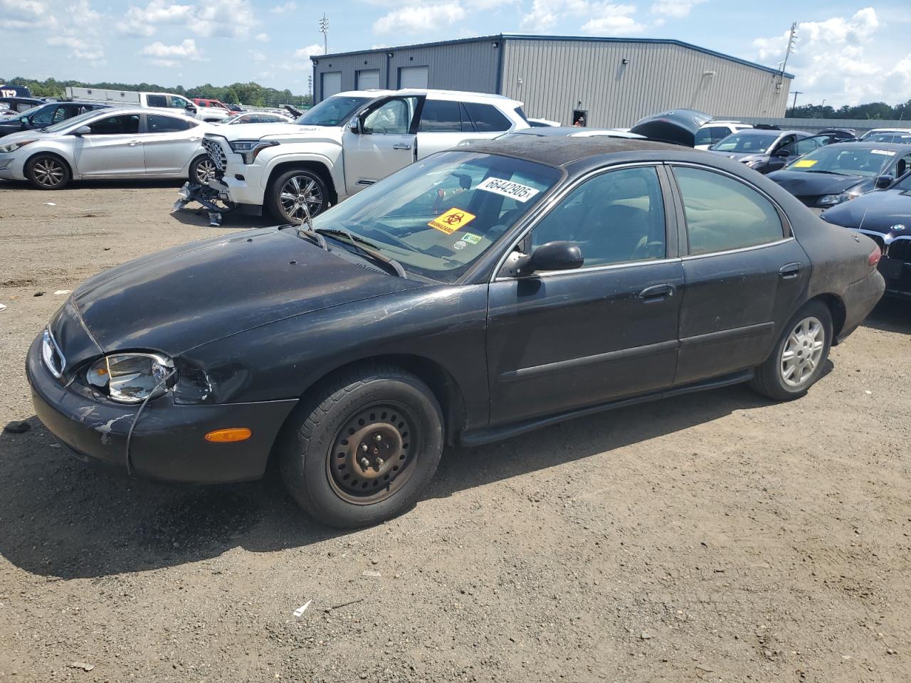 1999 Mercury Sable GS, VIN 1MEFM50U3XG629539 — Фото с аукциона 1 of 4