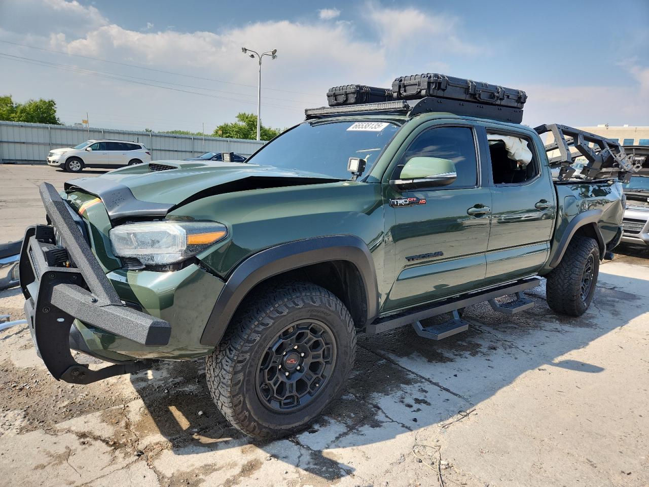 2021 Toyota Tacoma SR, VIN 3TMCZ5AN7MM424577 — Rollover