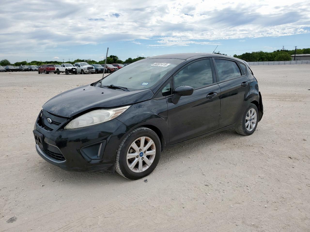 2011 Ford Fiesta SE, VIN 3FADP4EJXBM219303 — Rear end