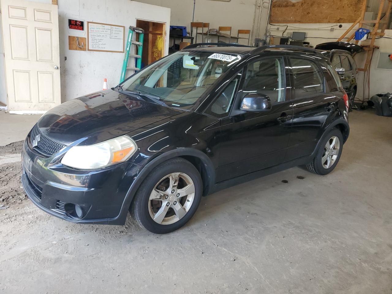 2012 Suzuki SX4 Crossover, VIN JS2YB5A33C6302358 — Hail