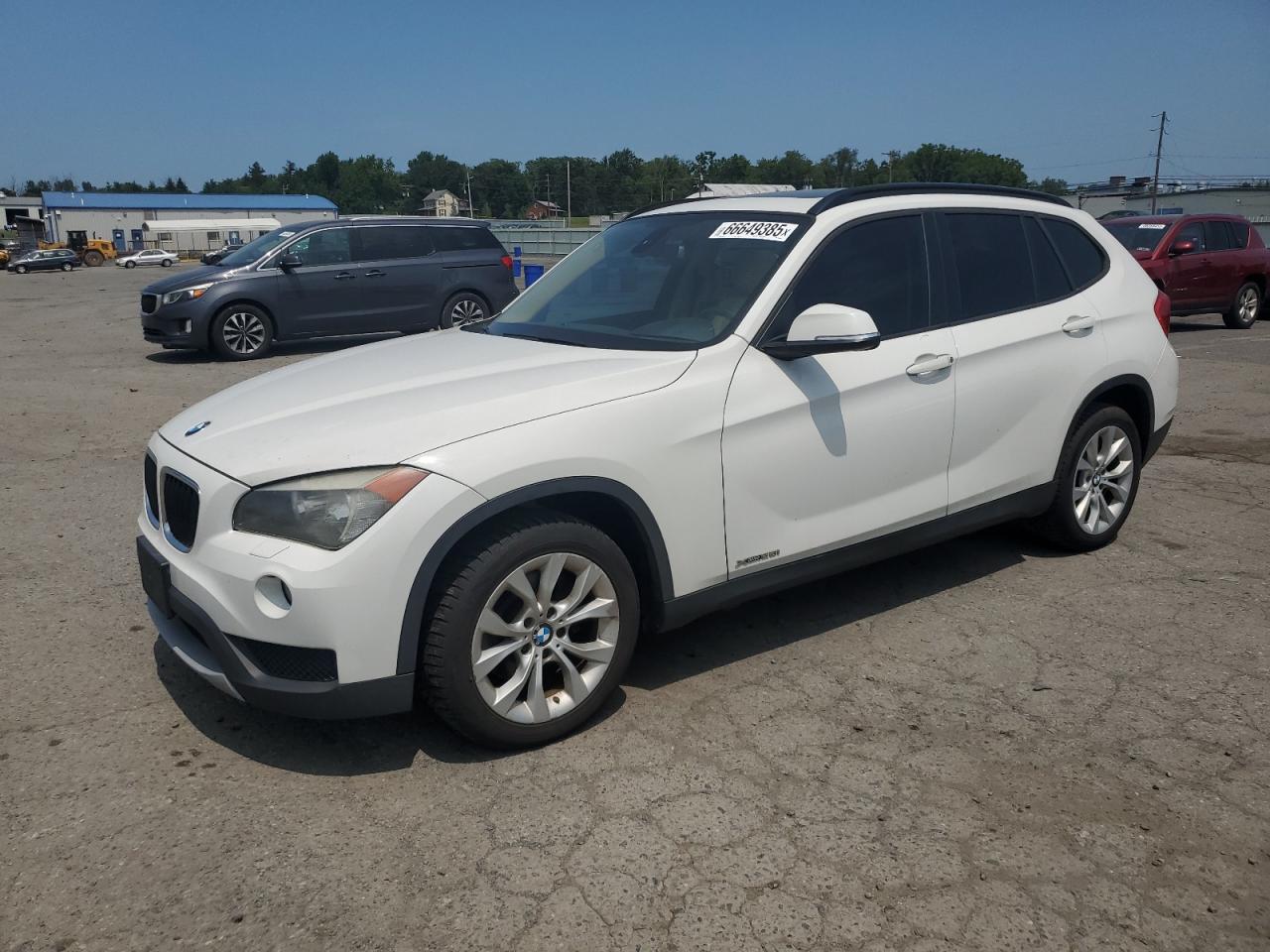 2014 BMW X1 xDrive28i, VIN WBAVL1C54EVR94640 — Water / flood