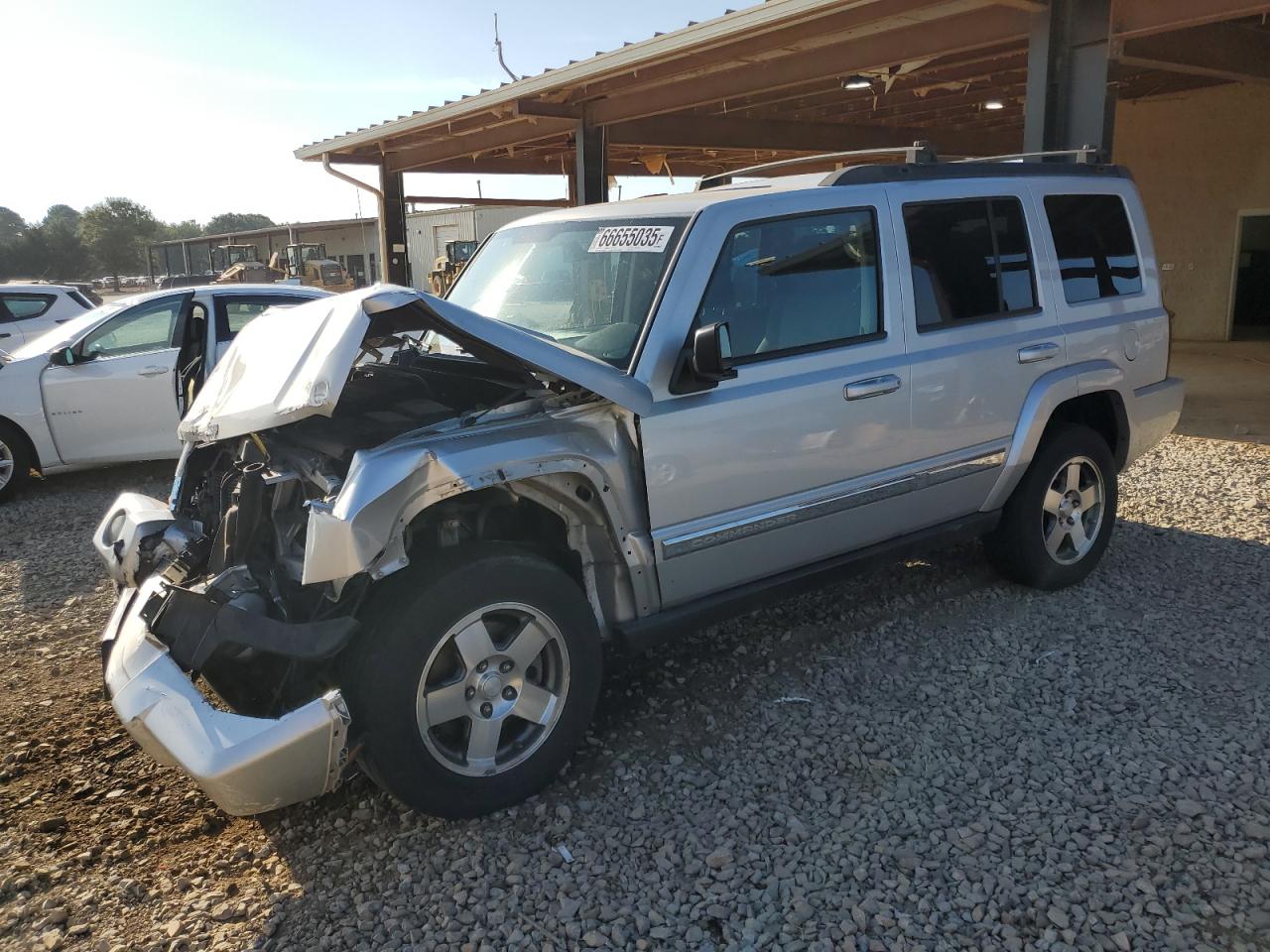 2010 Jeep Commander Sport, VIN 1J4RH4GK4AC159211 — Front end
