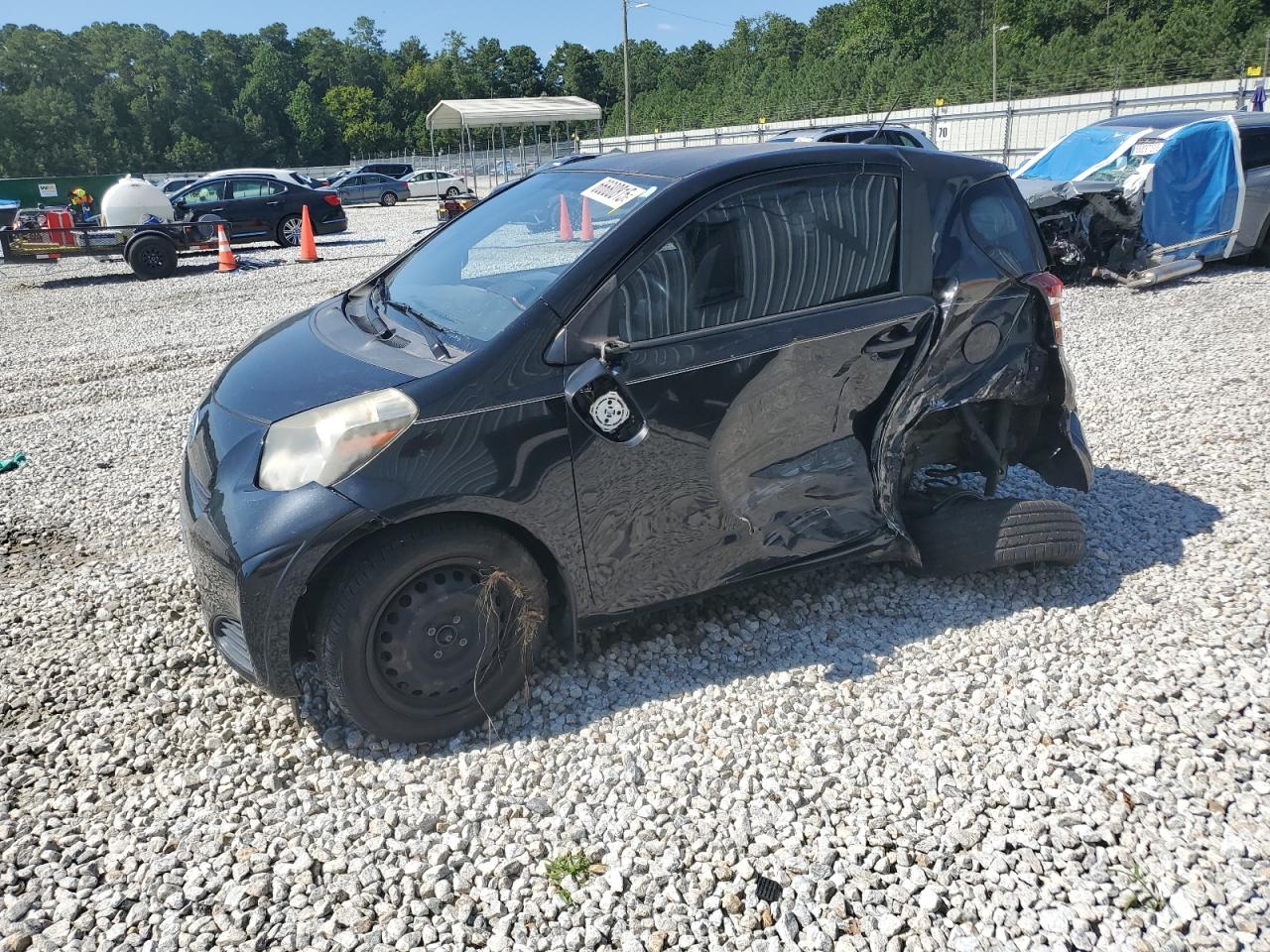 2012 Scion iQ, VIN JTNJJXB05CJ015451 — Side