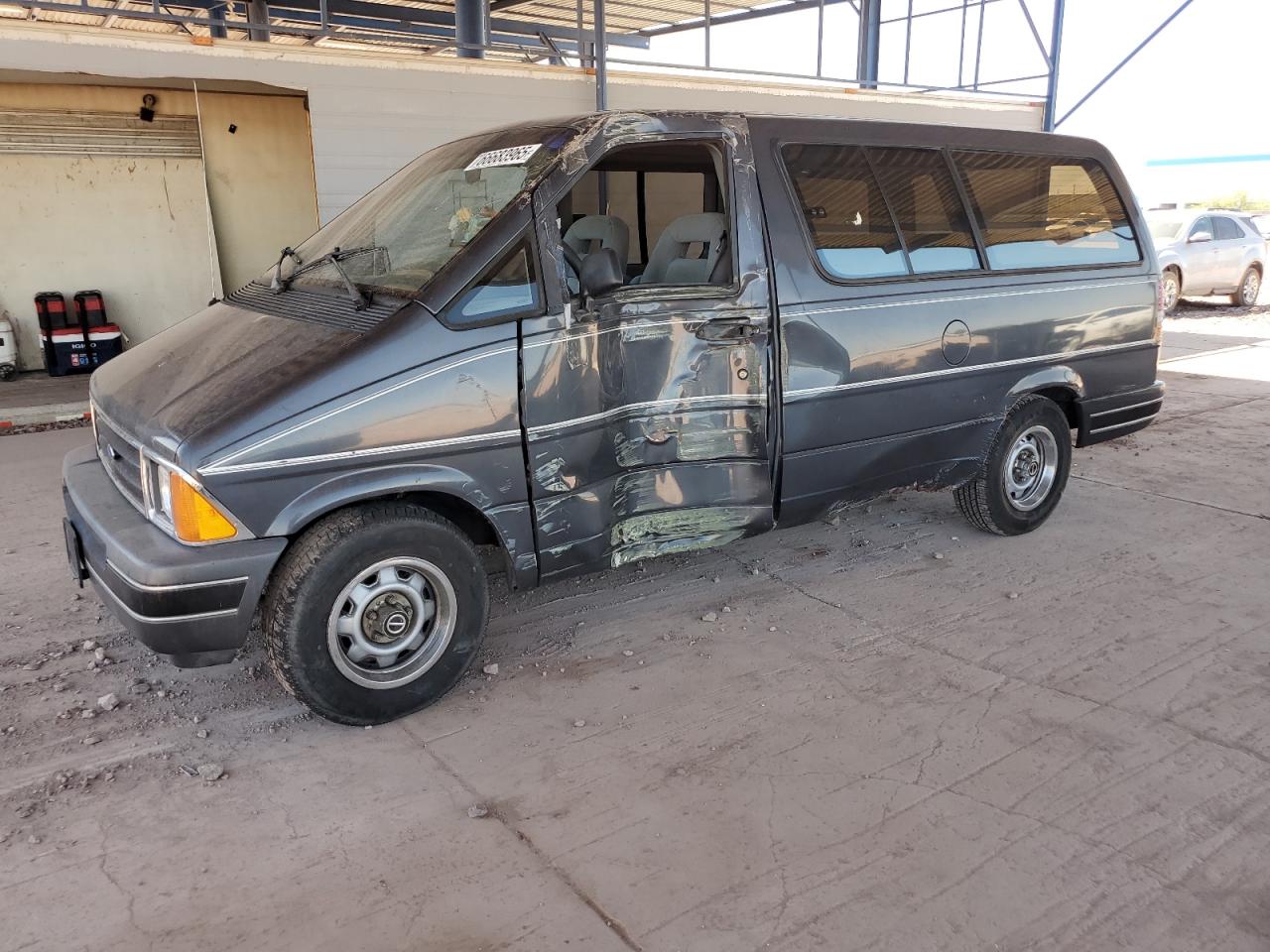 1990 Ford Aerostar, VIN 1FMDA31UXLZA73972 — Side