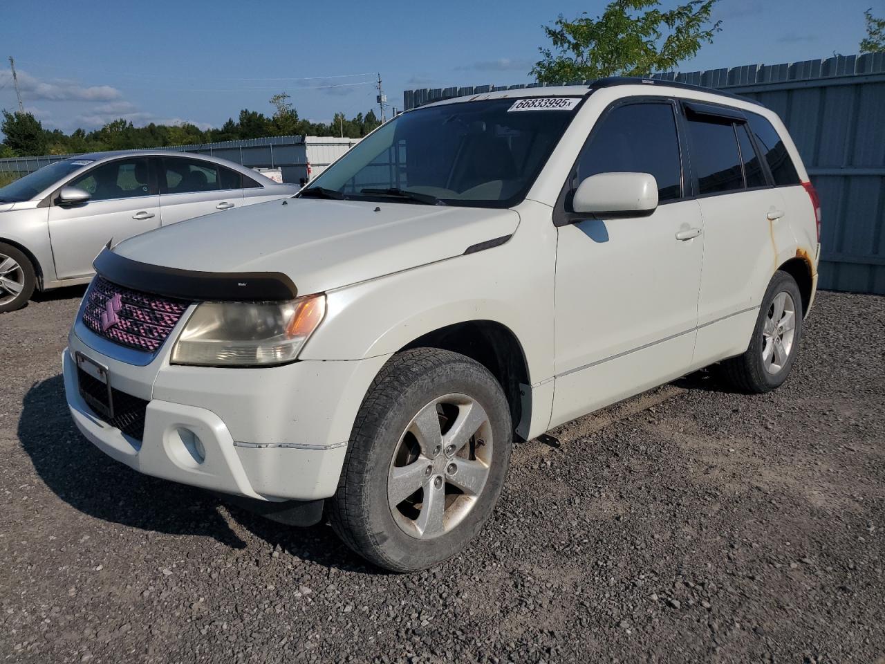 2011 Suzuki Grand Vitara Premium, VIN JS3TD0D22B4101132 — Rear end