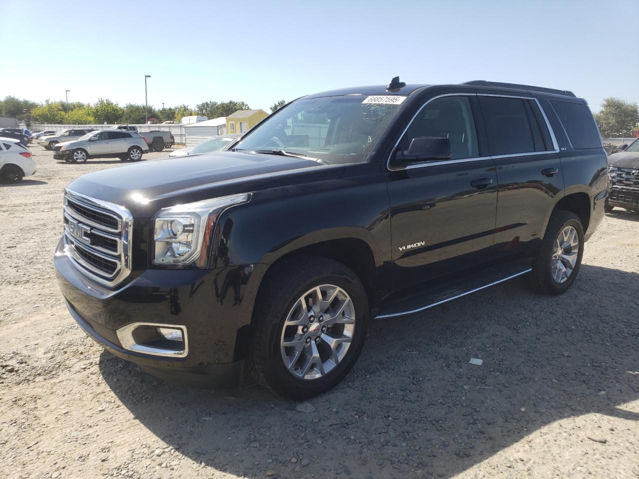 2017 GMC Yukon SLT, VIN 1GKS2BKC2HR351607 — Rear end