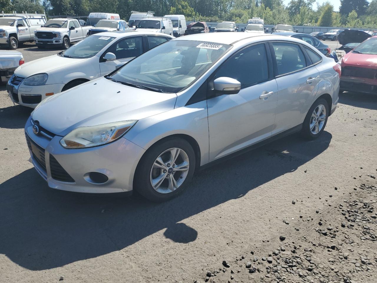 2013 Ford Focus SE, VIN 1FADP3F20DL190870 — Minor dents and scratches