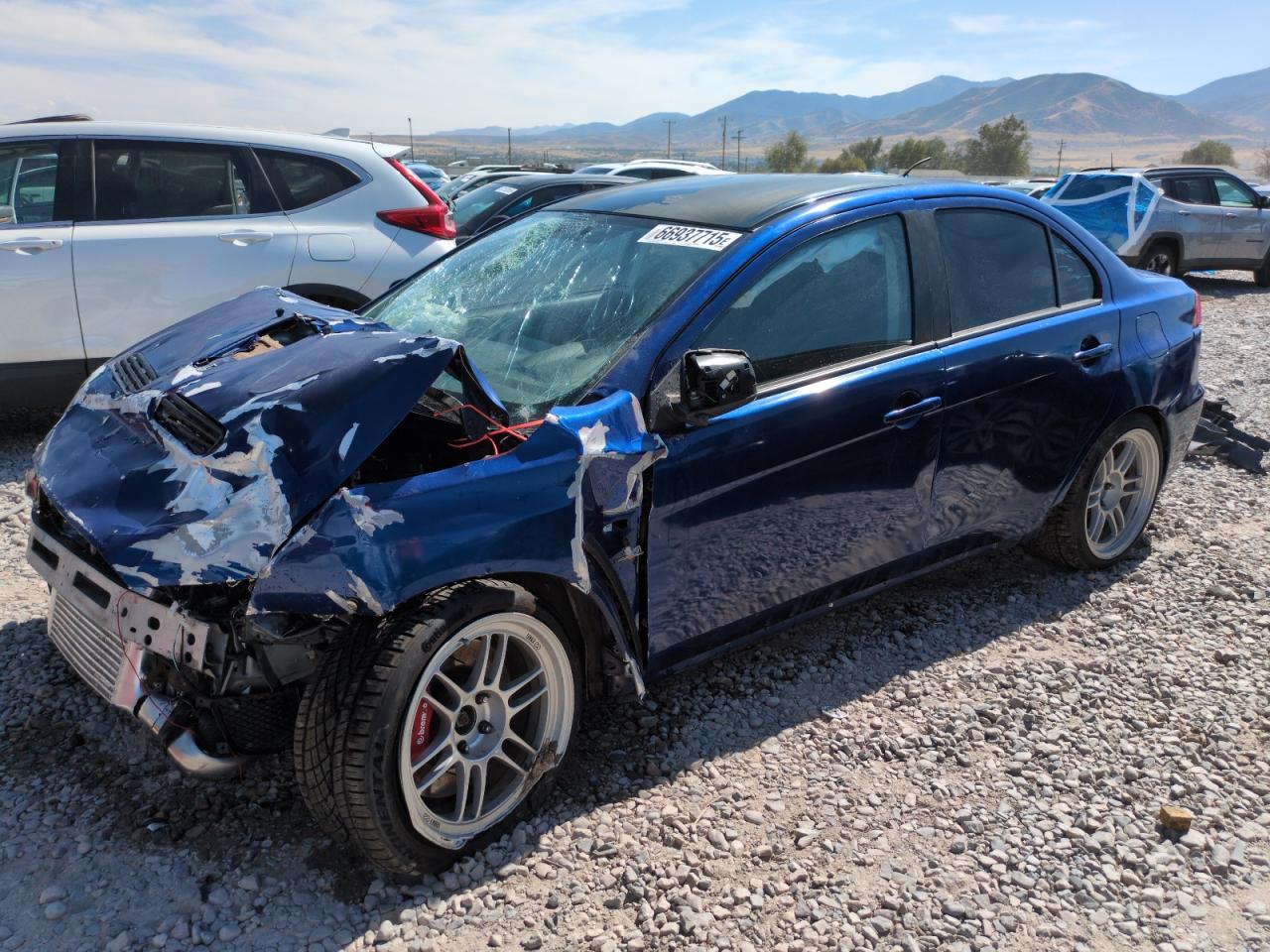 2013 Mitsubishi Lancer Evolution GSR, VIN JA32W8FV9DU008863 — Front end