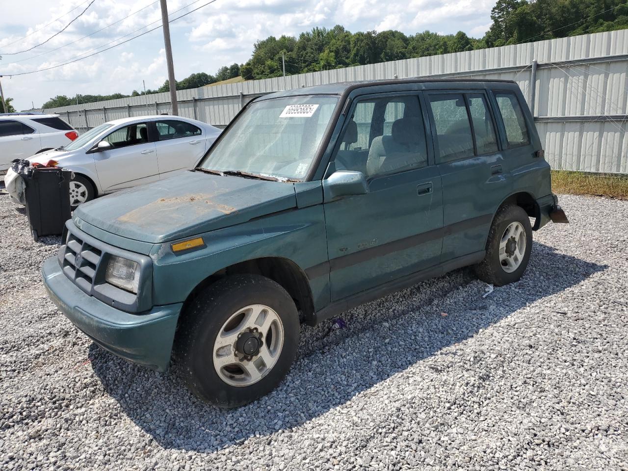 1996 Geo Tracker, VIN 2CNBJ1362T6903687 — Minor dents and scratches