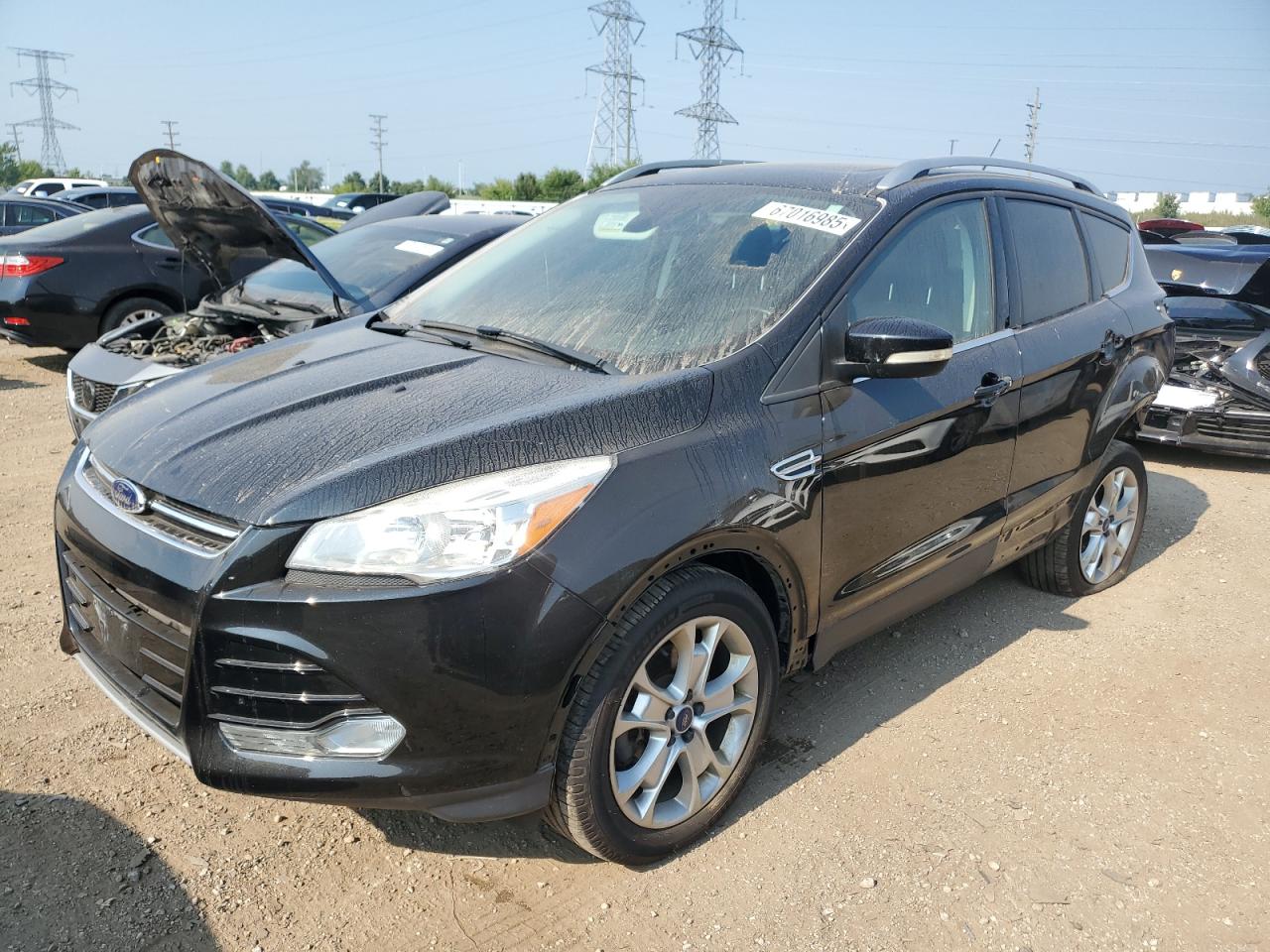 2015 Ford Escape Titanium, VIN 1FMCU9J93FUC75555 — Rear end