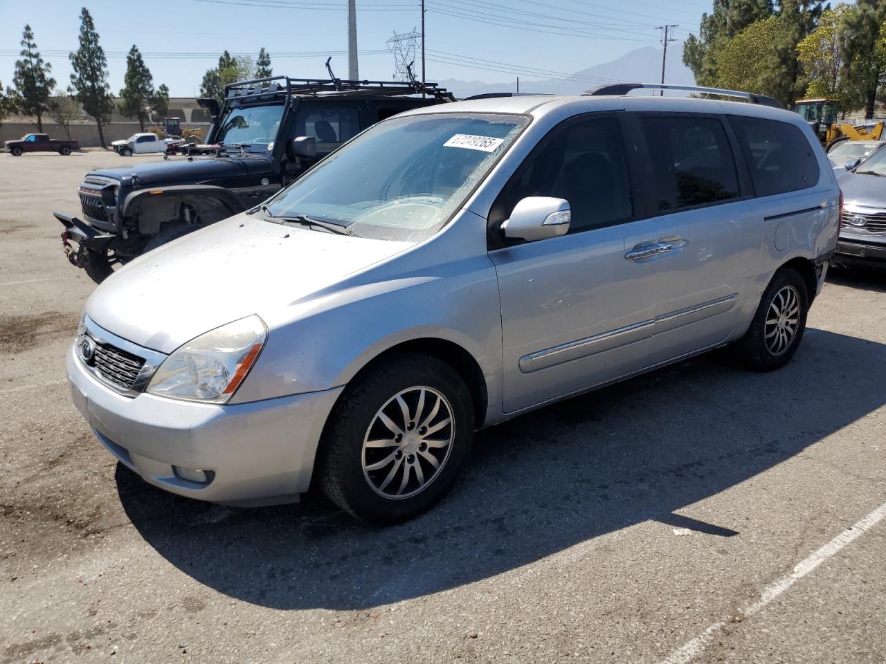2011 Kia Sedona EX, VIN KNDMH4C7XB6374013 — Rear end