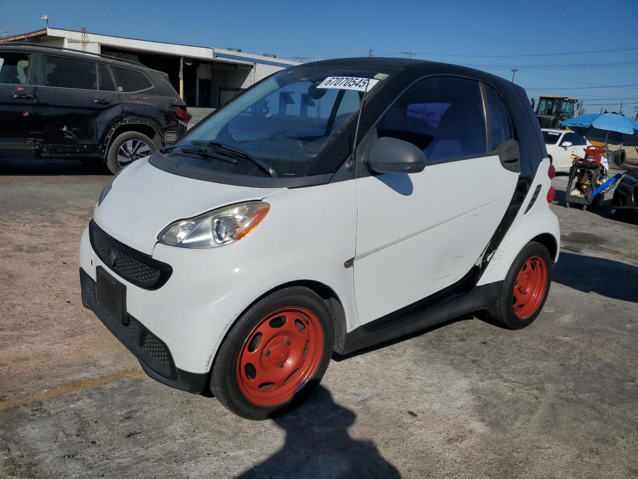 2013 Smart fortwo Pure, VIN WMEEJ3BA3DK598381 — Side
