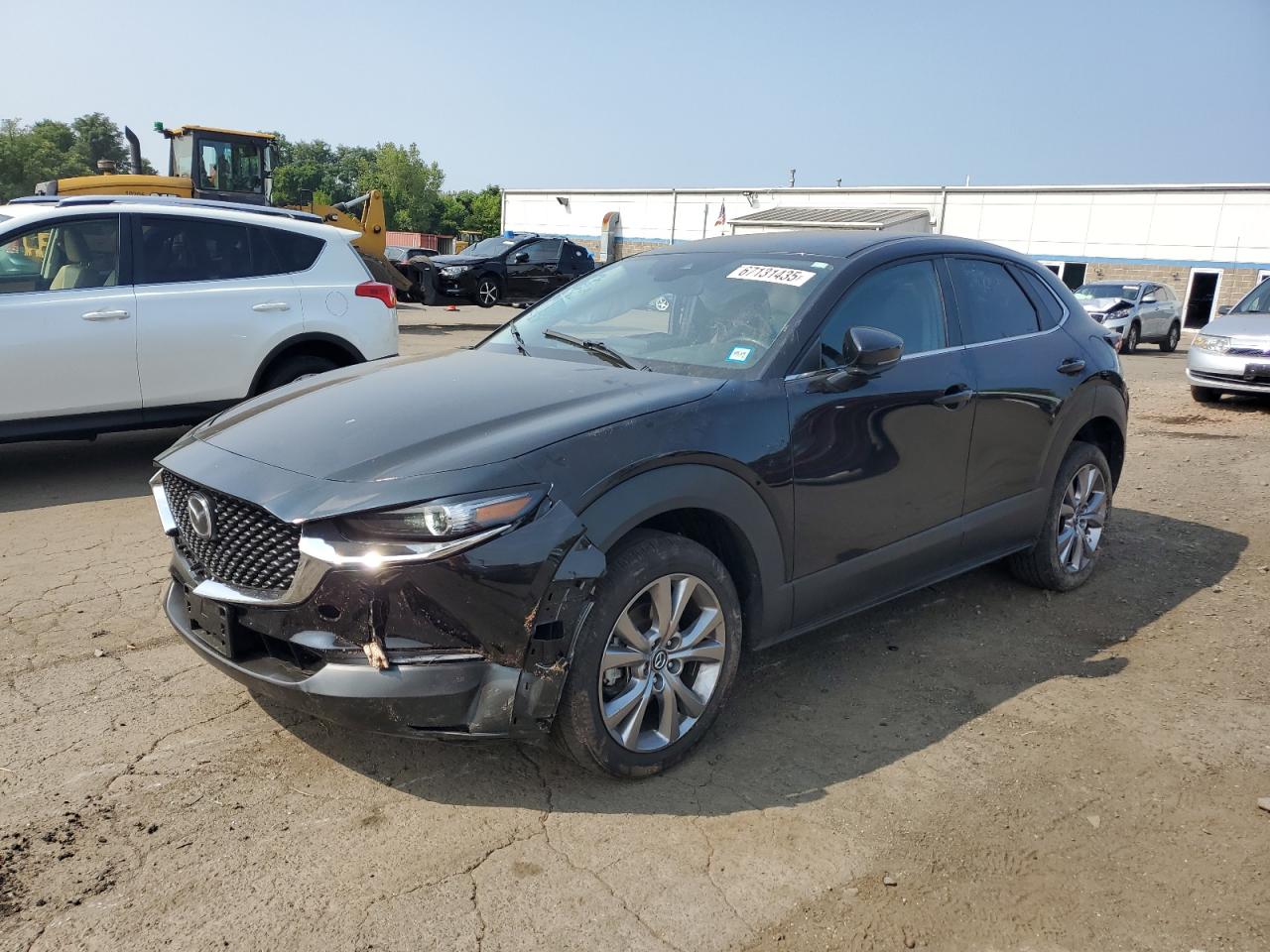 2021 Mazda CX-30 Select, VIN 3MVDMBBL0MM261204 — Side