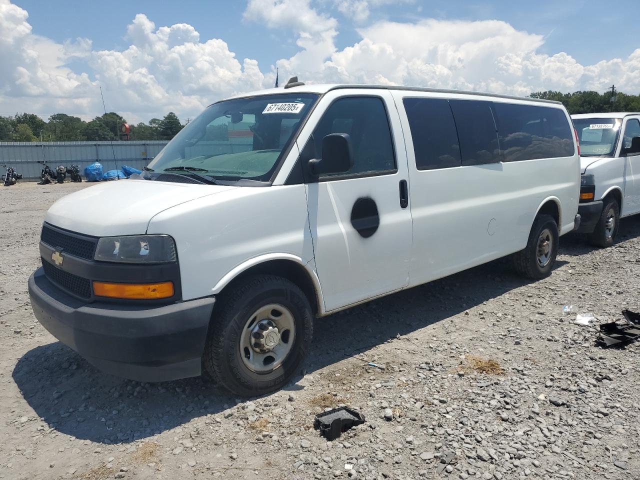 2018 Chevrolet Express Passenger LS, VIN 1GAZGNFP3J1223917 — Minor dents and scratches