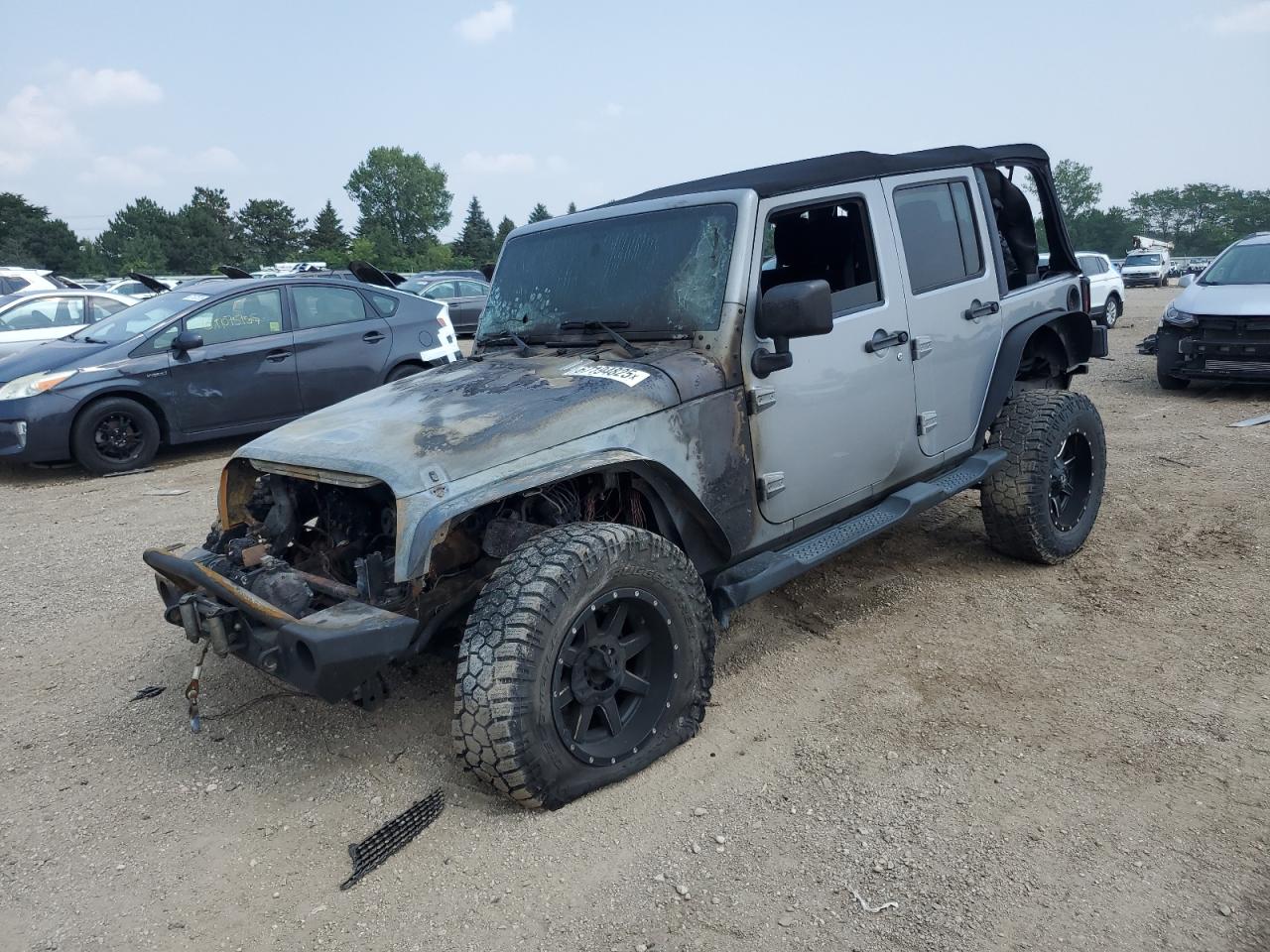2014 Jeep Wrangler Unlimited Altitude, VIN 1C4BJWEG0EL233817 — Фото с аукциона 1 of 12