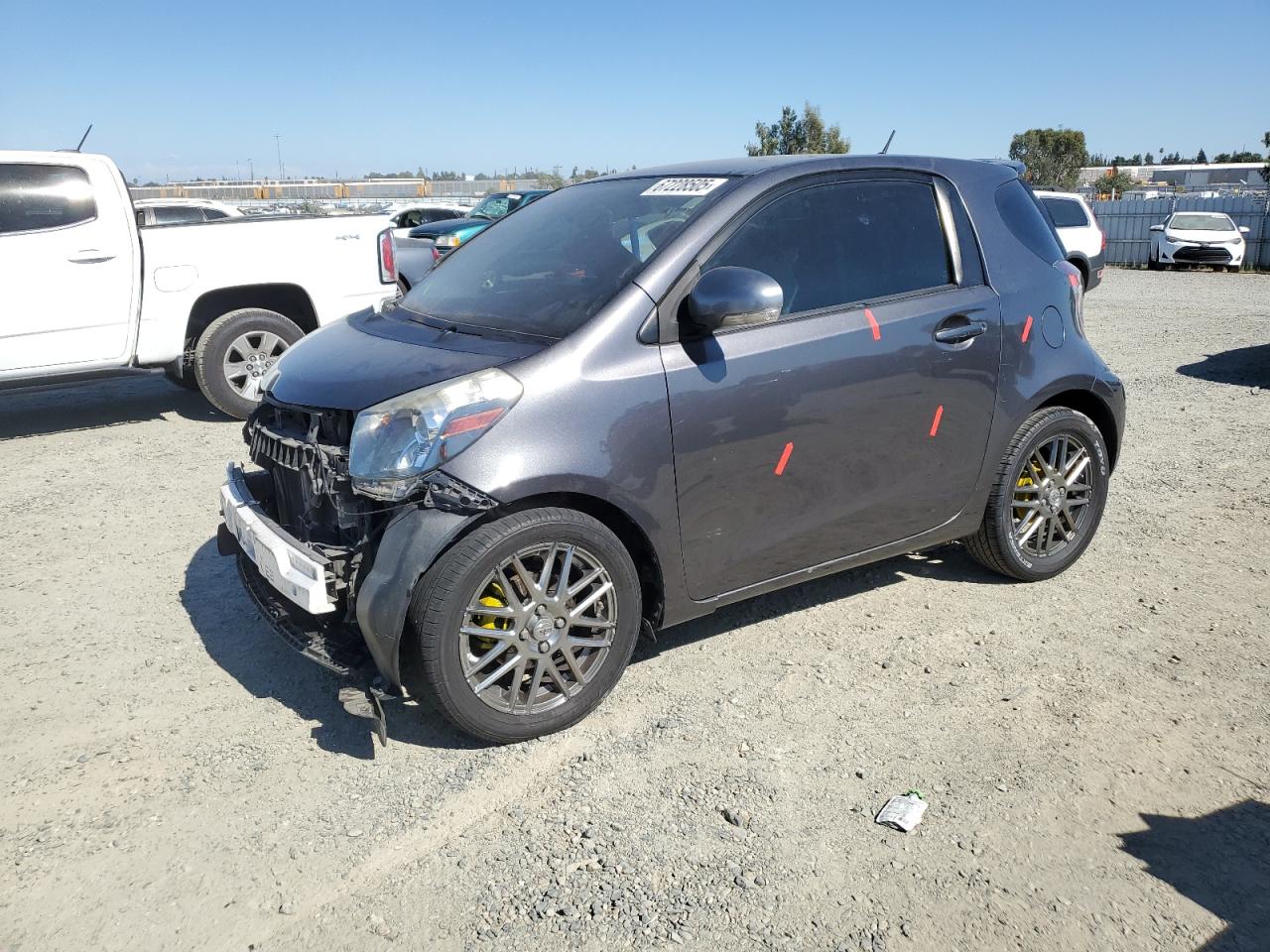 2012 Scion iQ, VIN JTNJJXB09CJ010883 — Front end